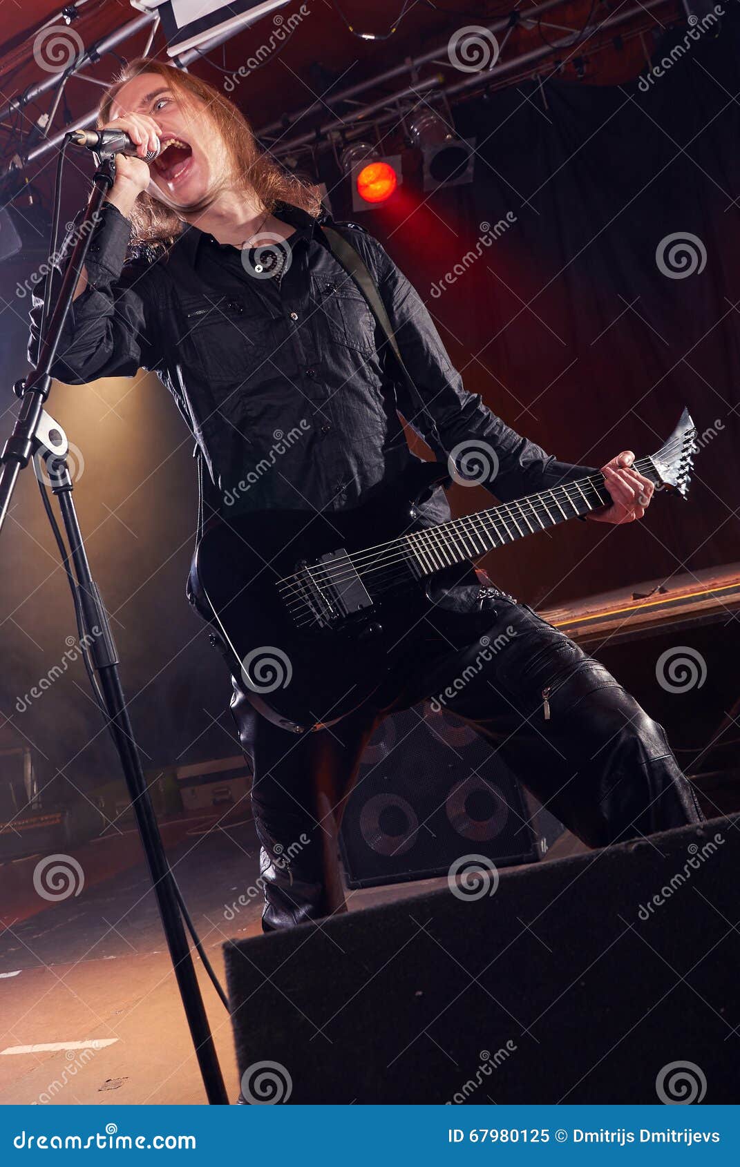Long Haired Guitarist is Playing and Singing Stock Image Image of
