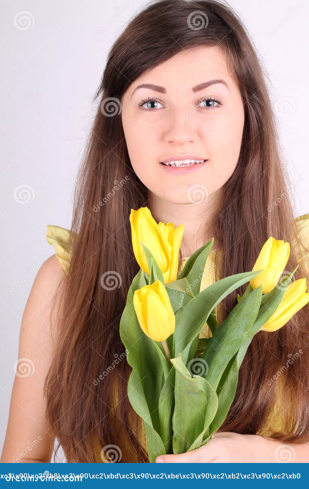 Longhaired Romantic Girl with Yellow Tulips Stock Image Image of
