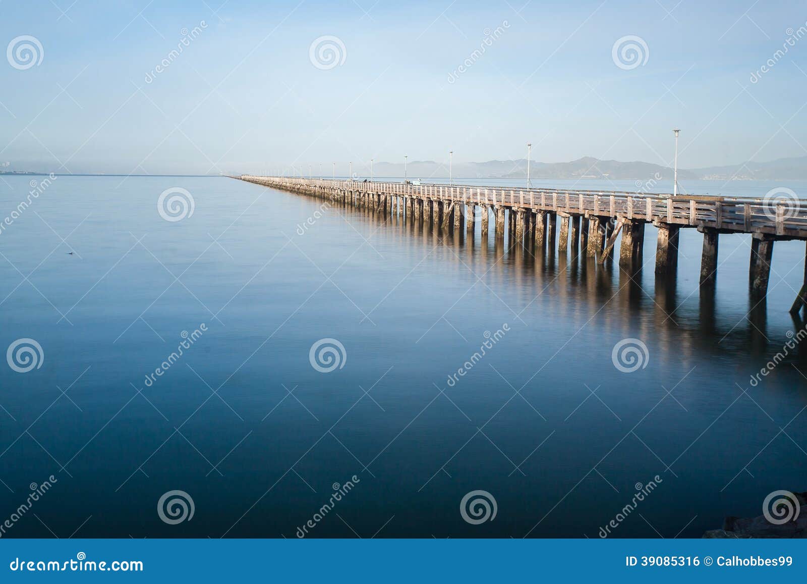 Long Pier Stretching Out in the Water Stock Photo Image of stretching