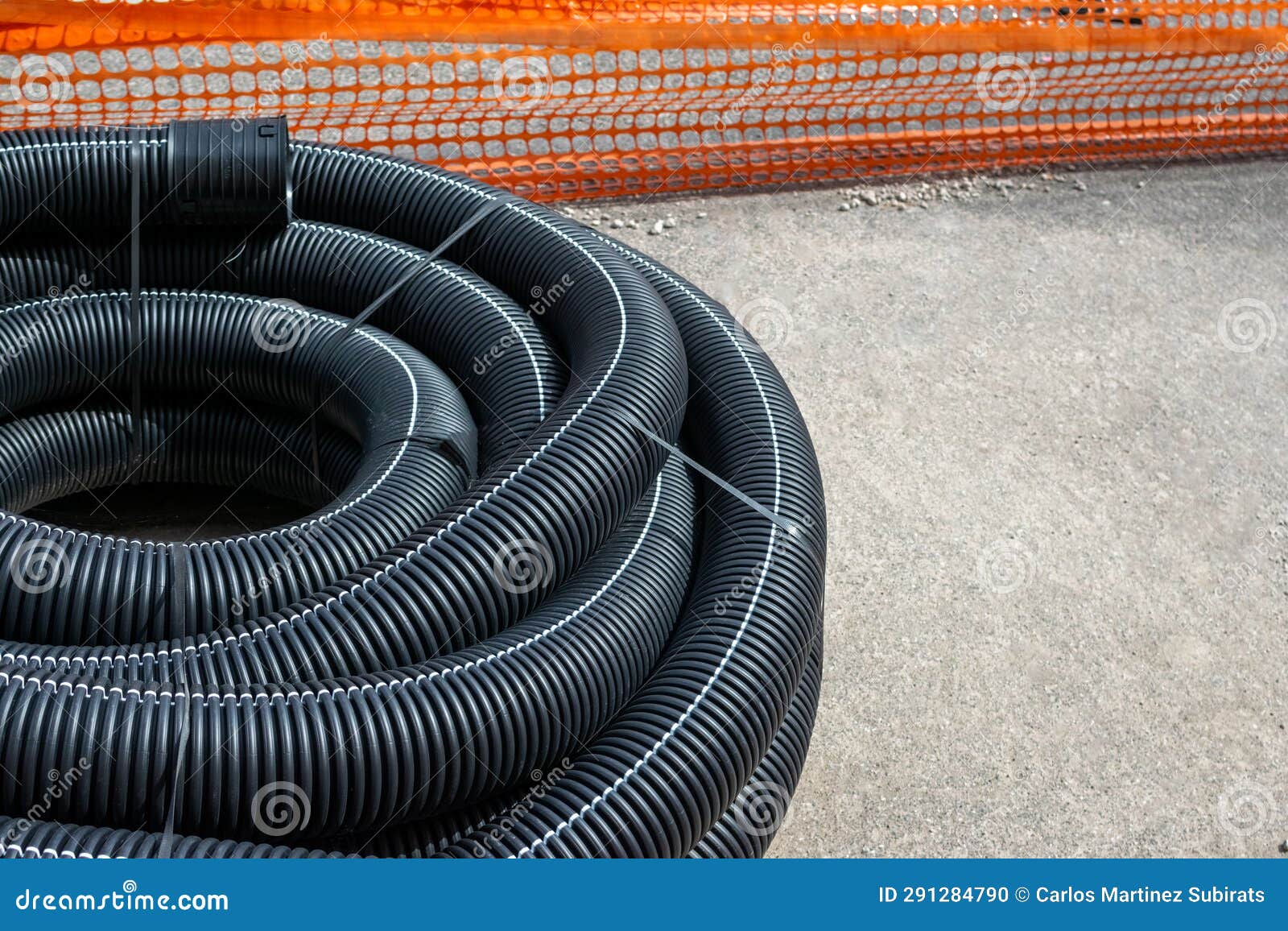 Long Plastic Tubes in Works Area for Remodeling Subsoil for Electrical Systems Stock Photo