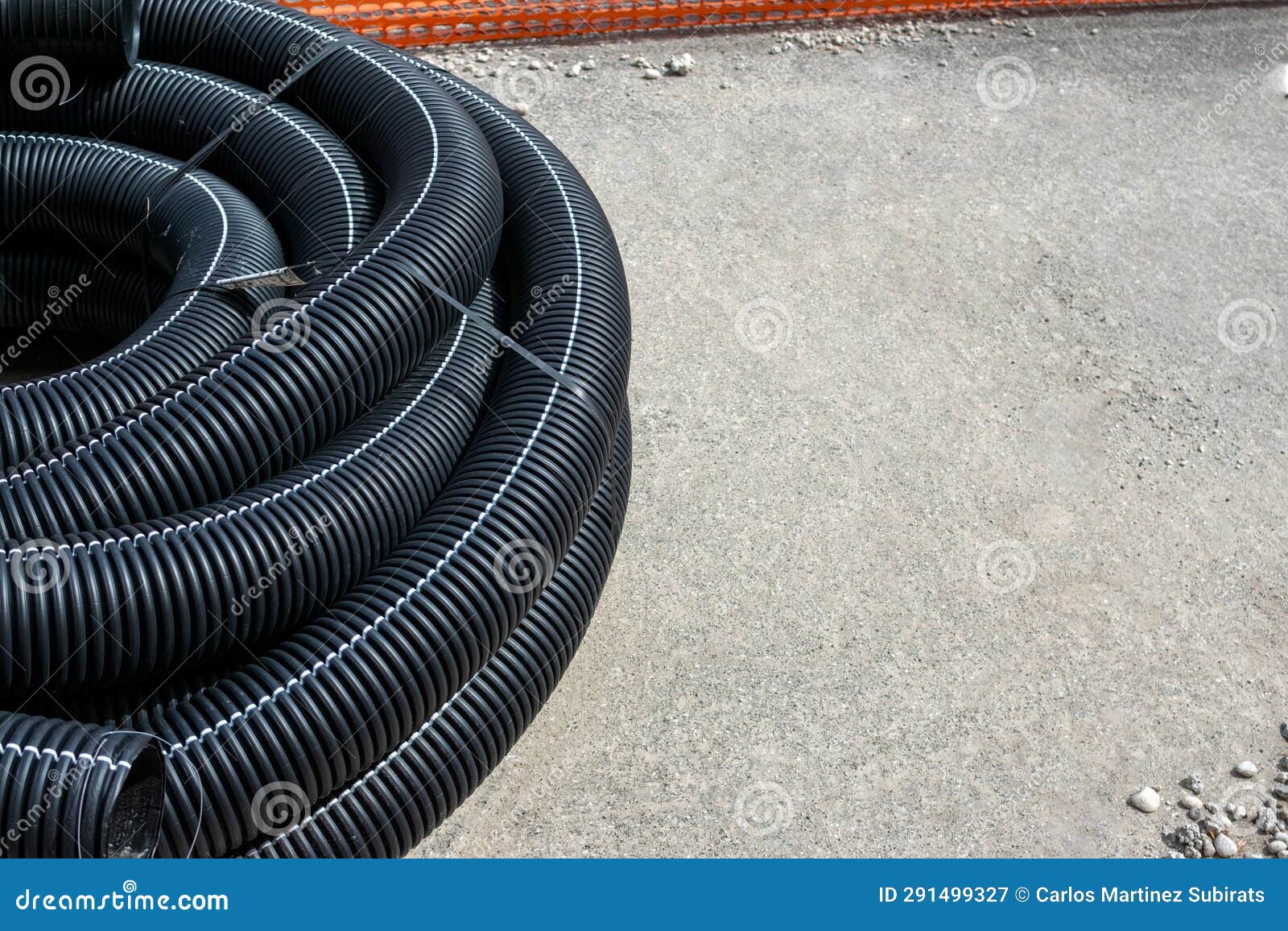 Long Plastic Tubes in Works Area for Remodeling Subsoil for Electrical