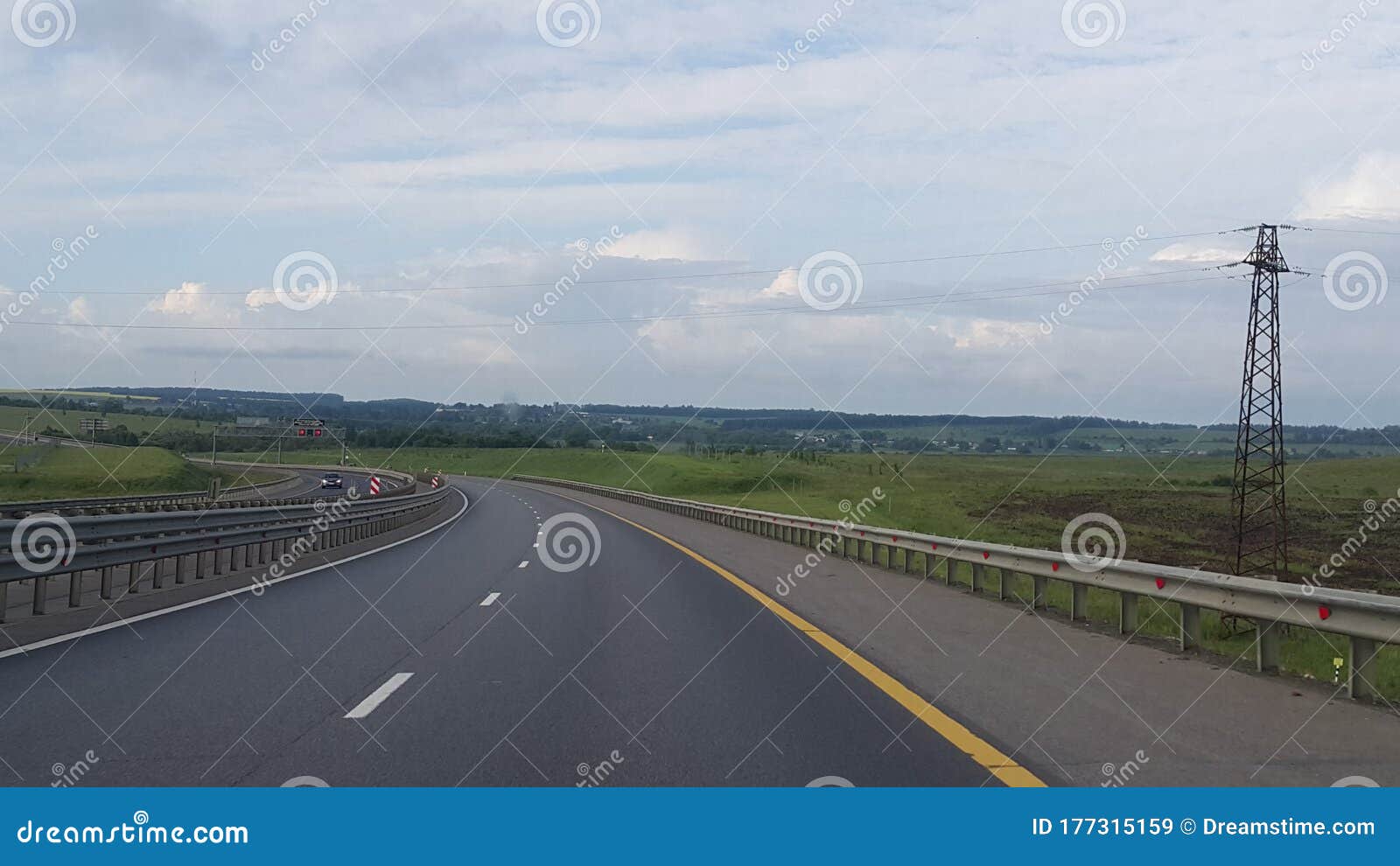 long road with landscape view