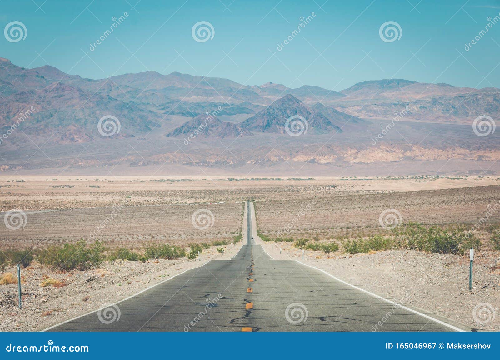 Long Straight Road In Death Valley National Park, USA Stock Image ...