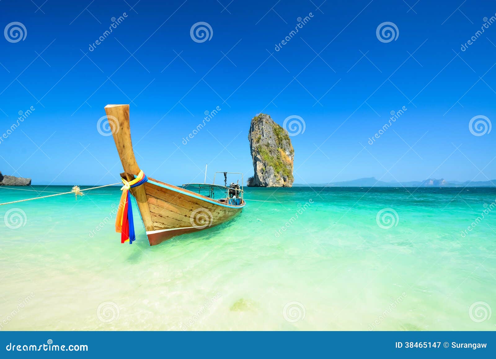 Long tail boats at the beautiful beach landscape in Thailand