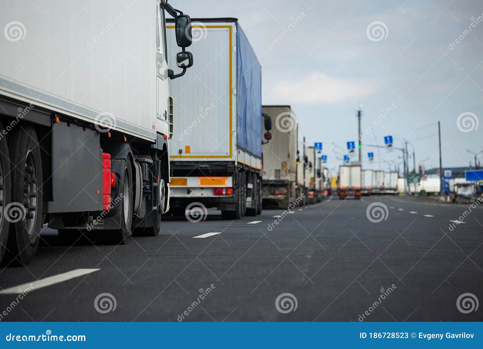 a long traffic jam of trucks on a closed border