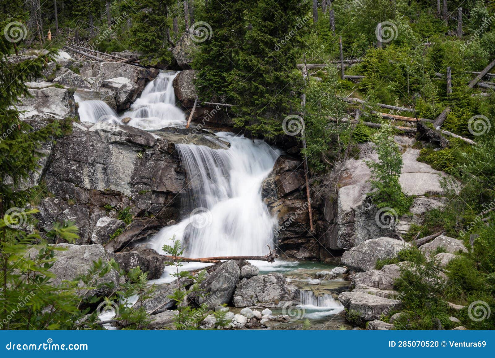 long waterfall on cold water creek close to hrebienok in high tatras, slovakia