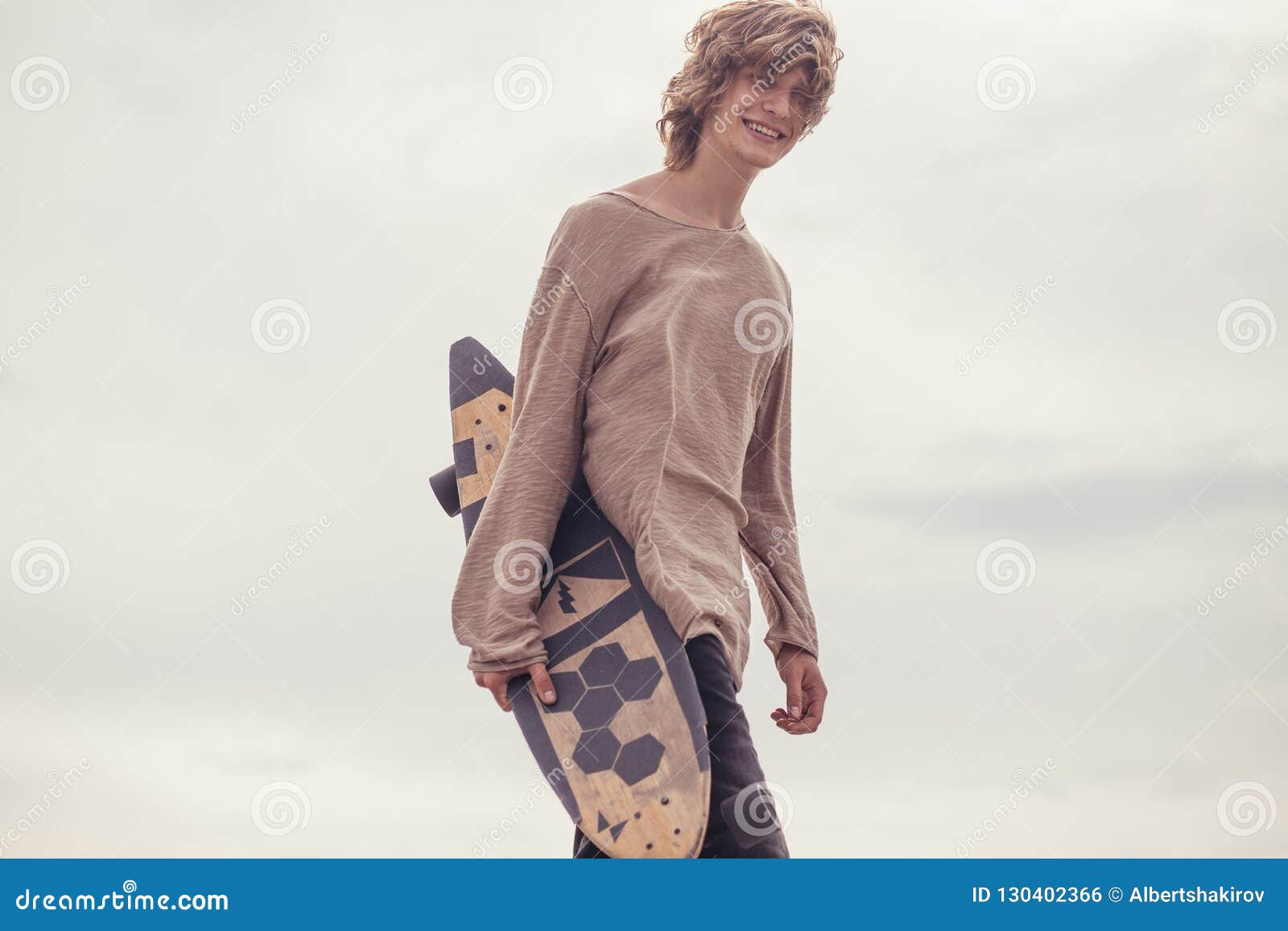 madras flyde Spaceship Stylish Man Stands on Street and Hold Long Board in Hands Stock Photo -  Image of skateboard, apparel: 130402366