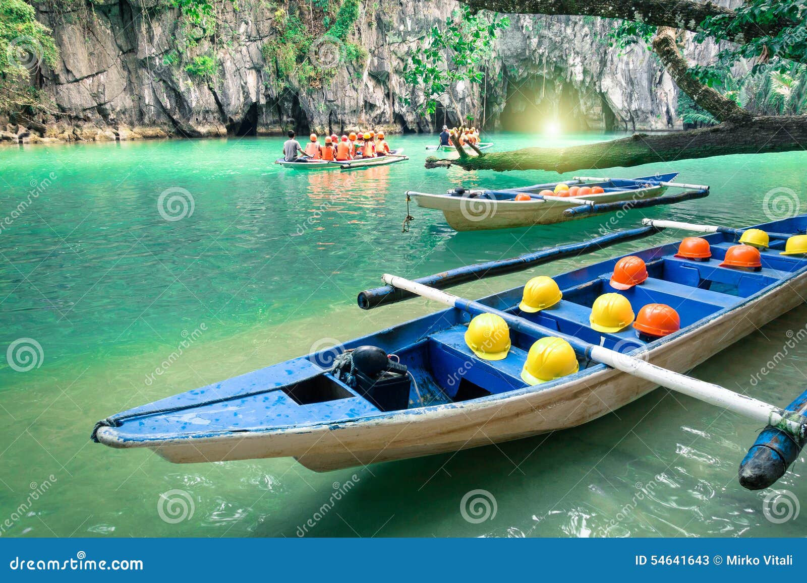 longtail boats at cave entrance of puerto princesa philippines