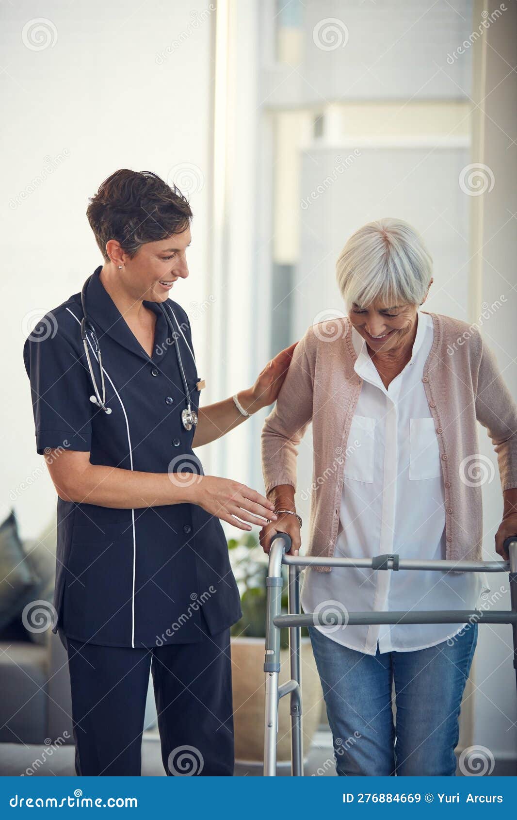 Look How Much Progress Youve Made. a Young Female Nurse Assisting a