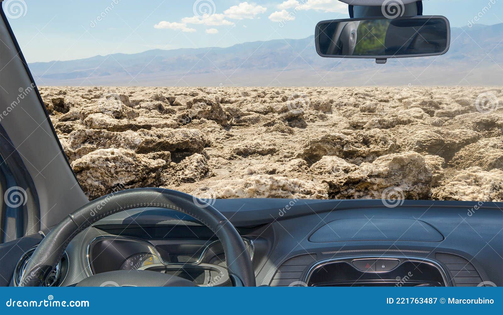 Car Windshield View of Devil`s Golf Course, Death Valley, USA Stock