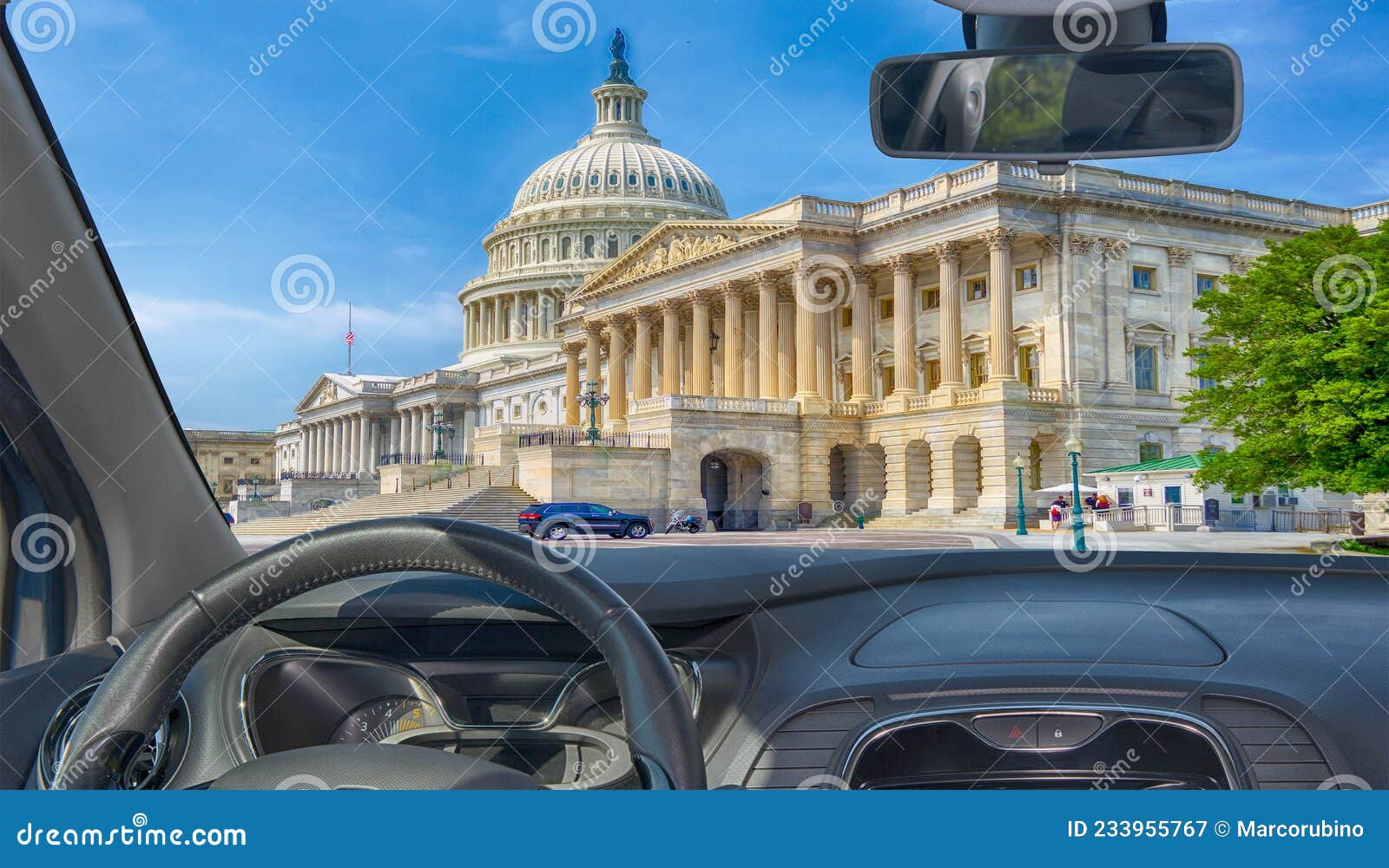 windshield view of united states capitol building, washington dc, usa