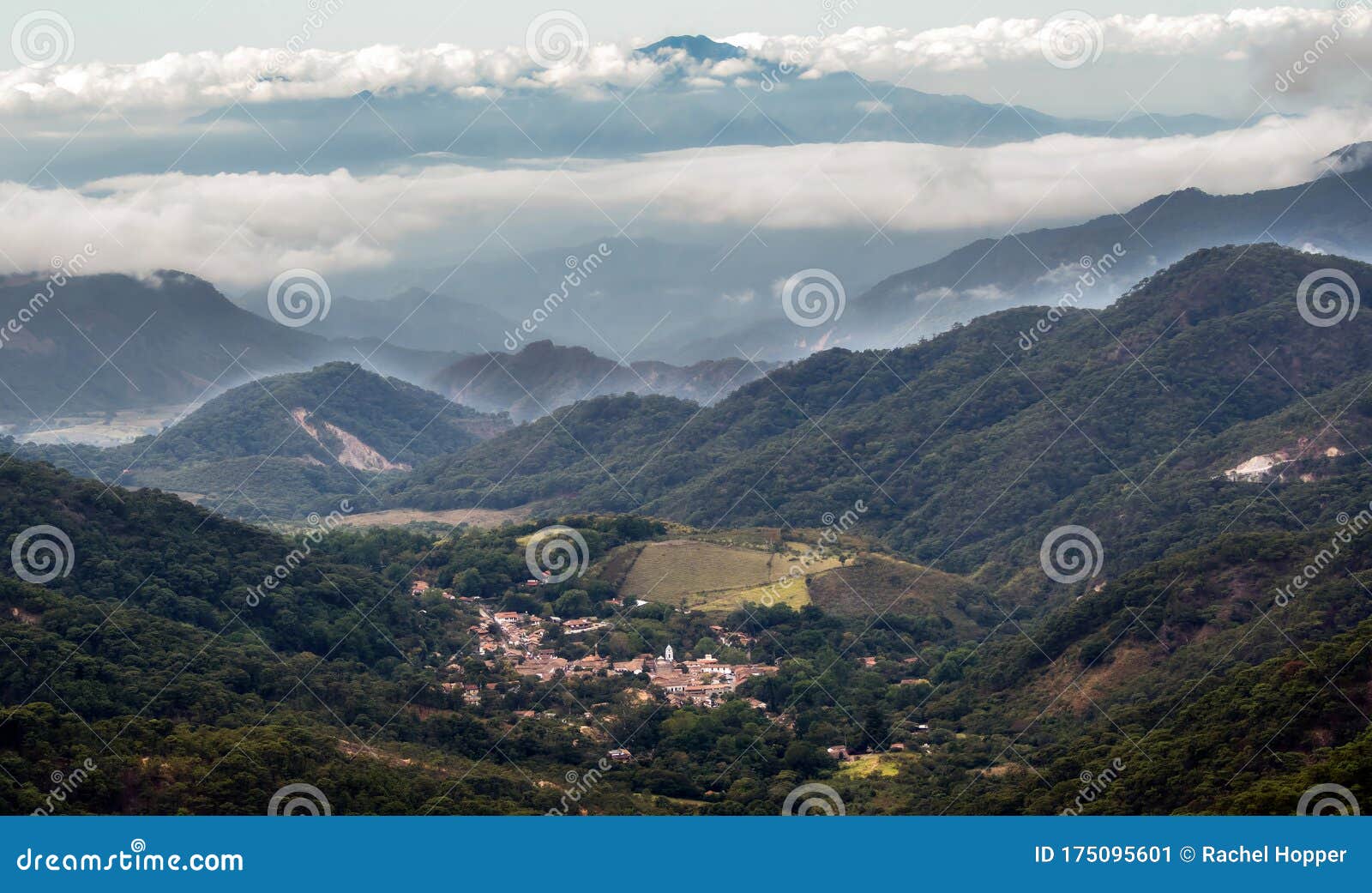 looking at the mexican town of el tuito from la bufa in a forested landscape, jalisco, mexico