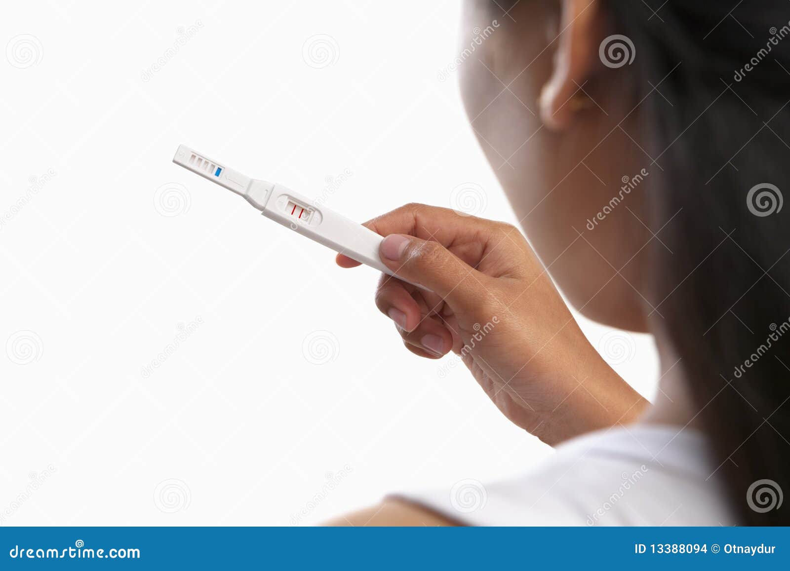 looking at pregnancy test result