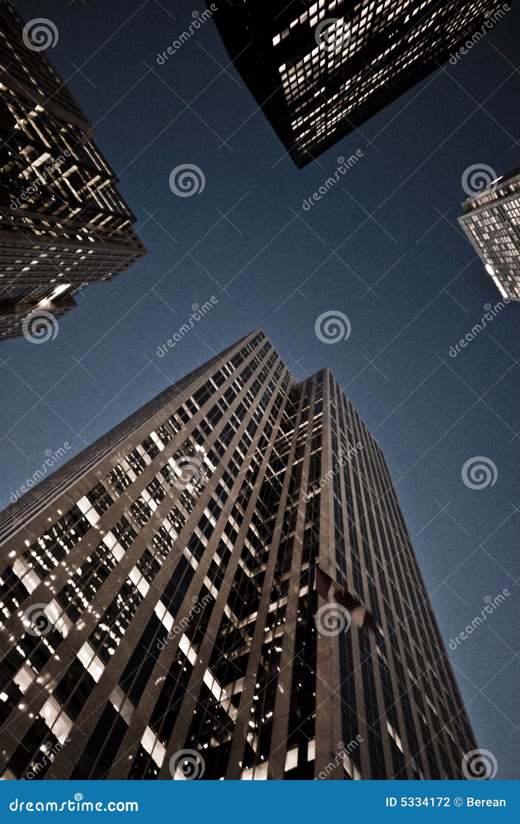 looking up at skyscrapers