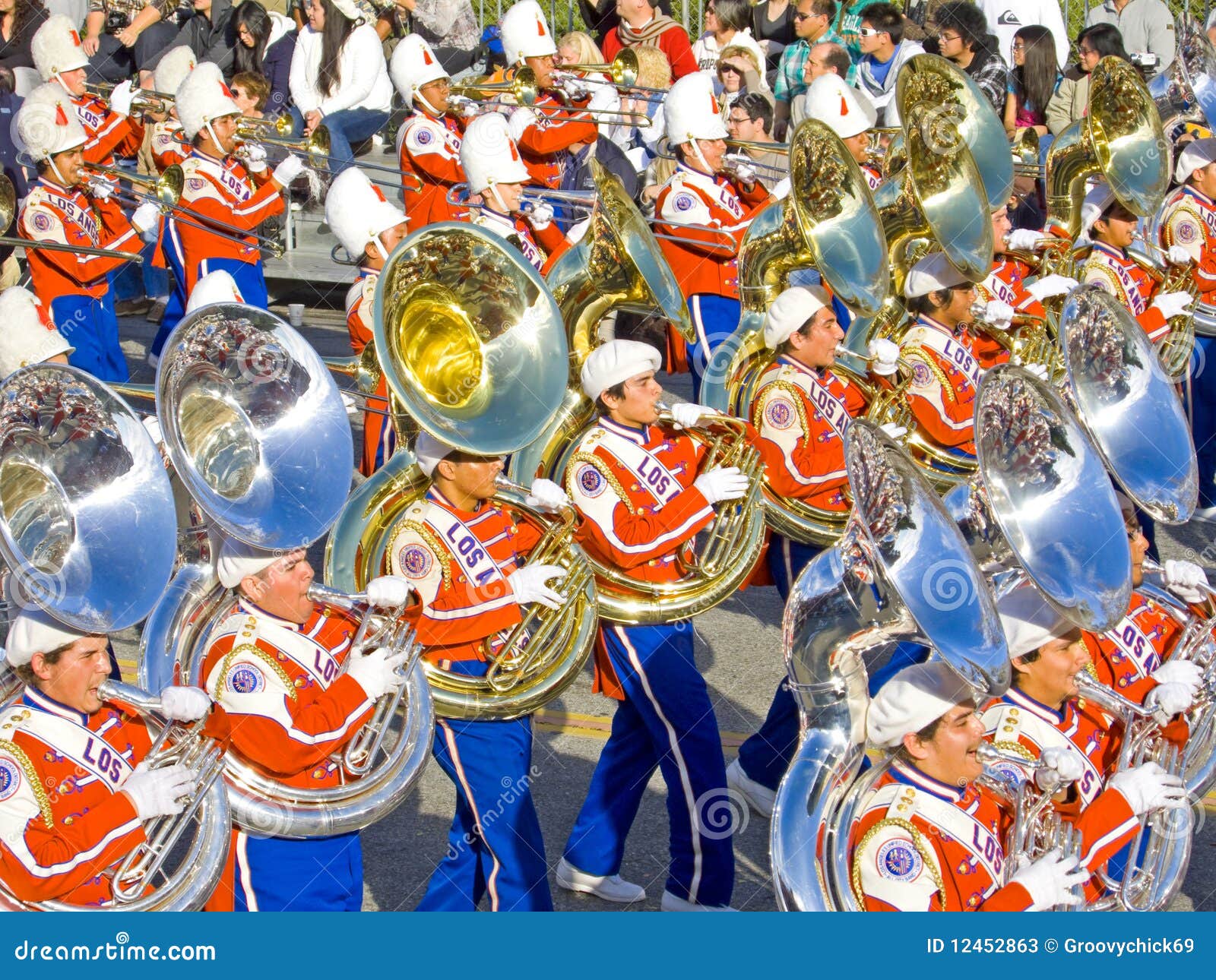 Marching Band And Girls With Flags Editorial Photo