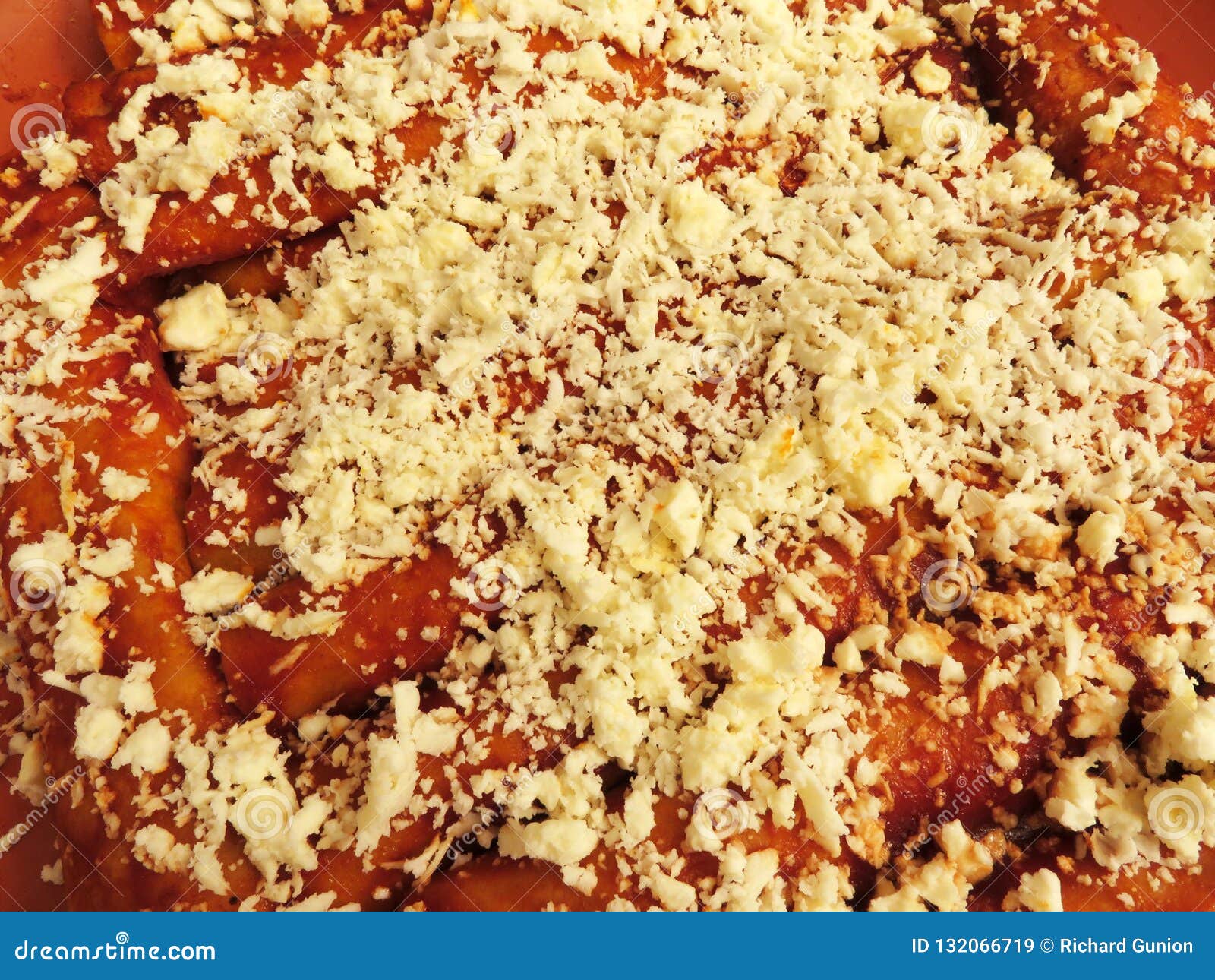 Los Enchiladas Del Queso Remataron Con Queso Imagen de archivo Imagen