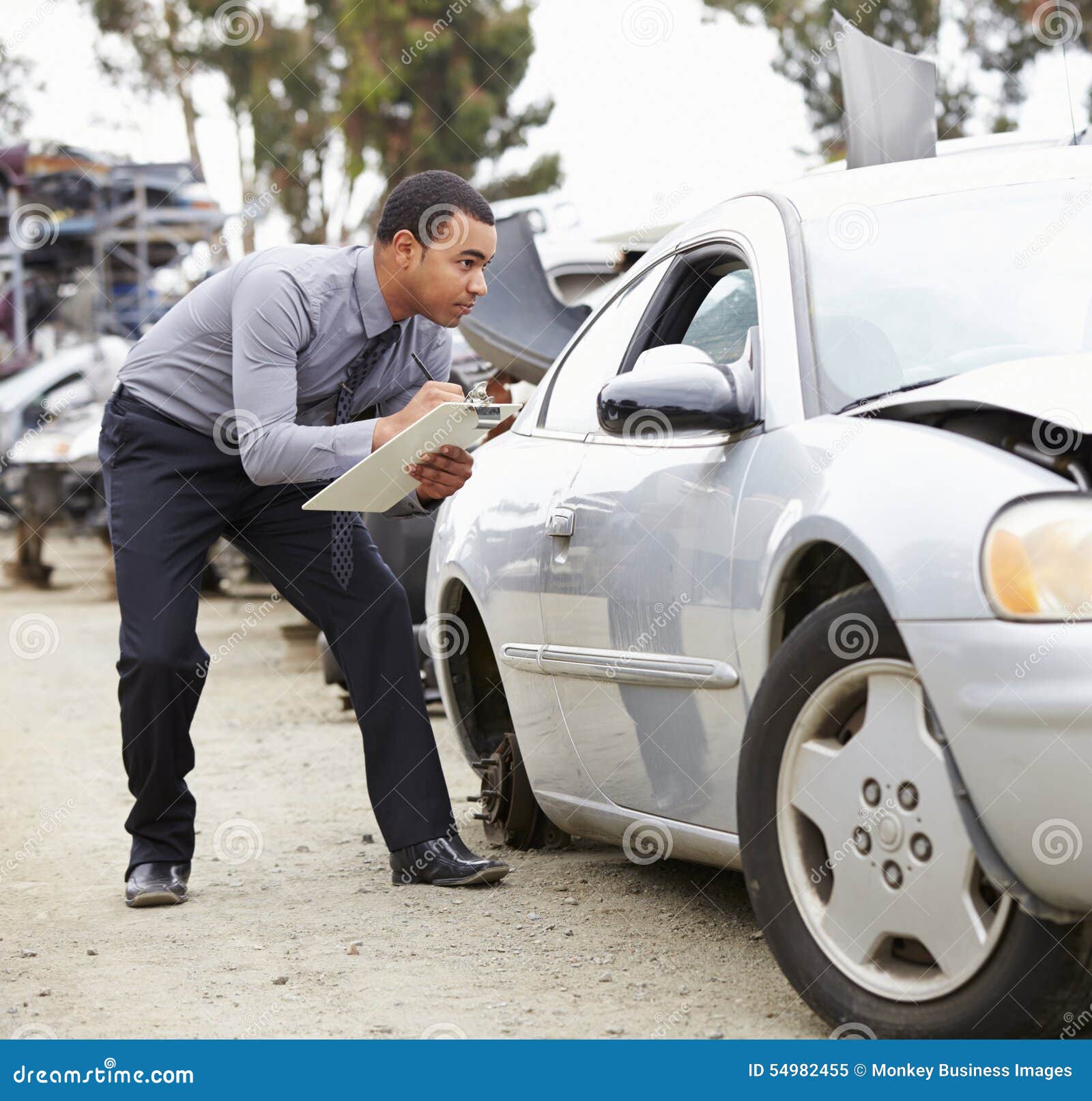 Loss Adjuster Inspecting Car Involved in Accident Stock Image Image
