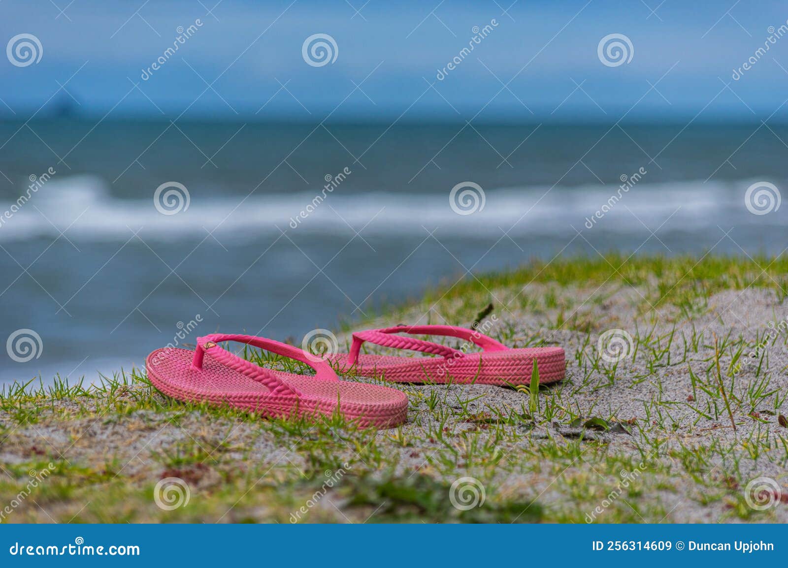 lost footwear in sanddunes at beach.