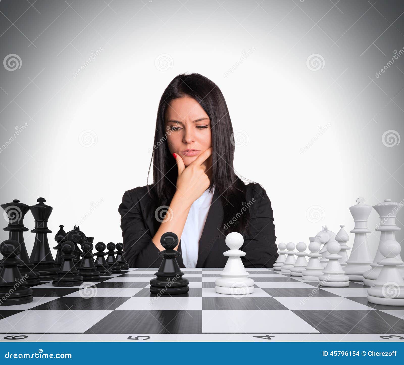 Premium Photo  Woman playing chess online uses laptop