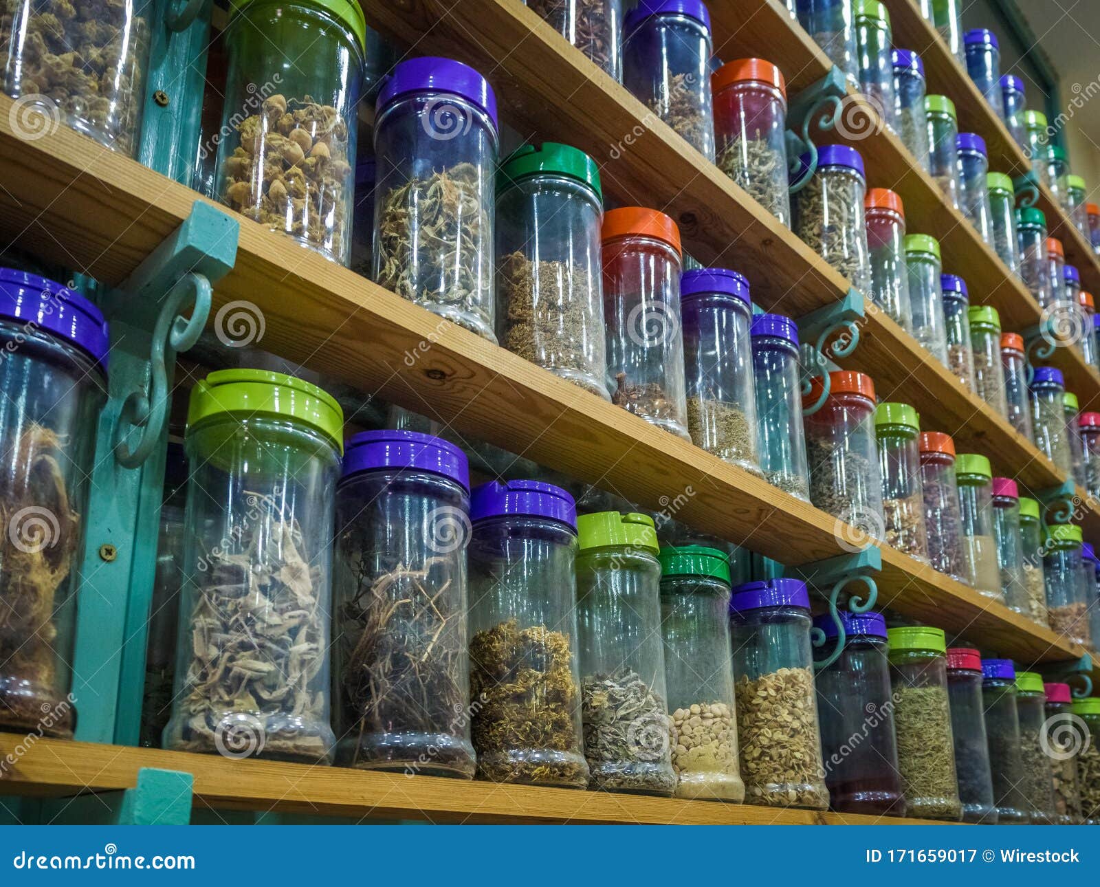 Lot of Jars of Different Dried Pharmacy in the Shelves in Morocco Stock