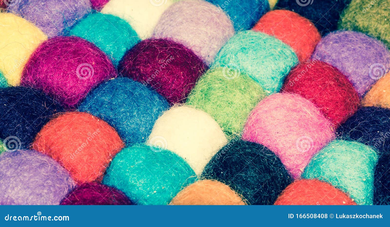 A Lot of Multicolored Balls of Cotton for Knitting Closeup. Colored