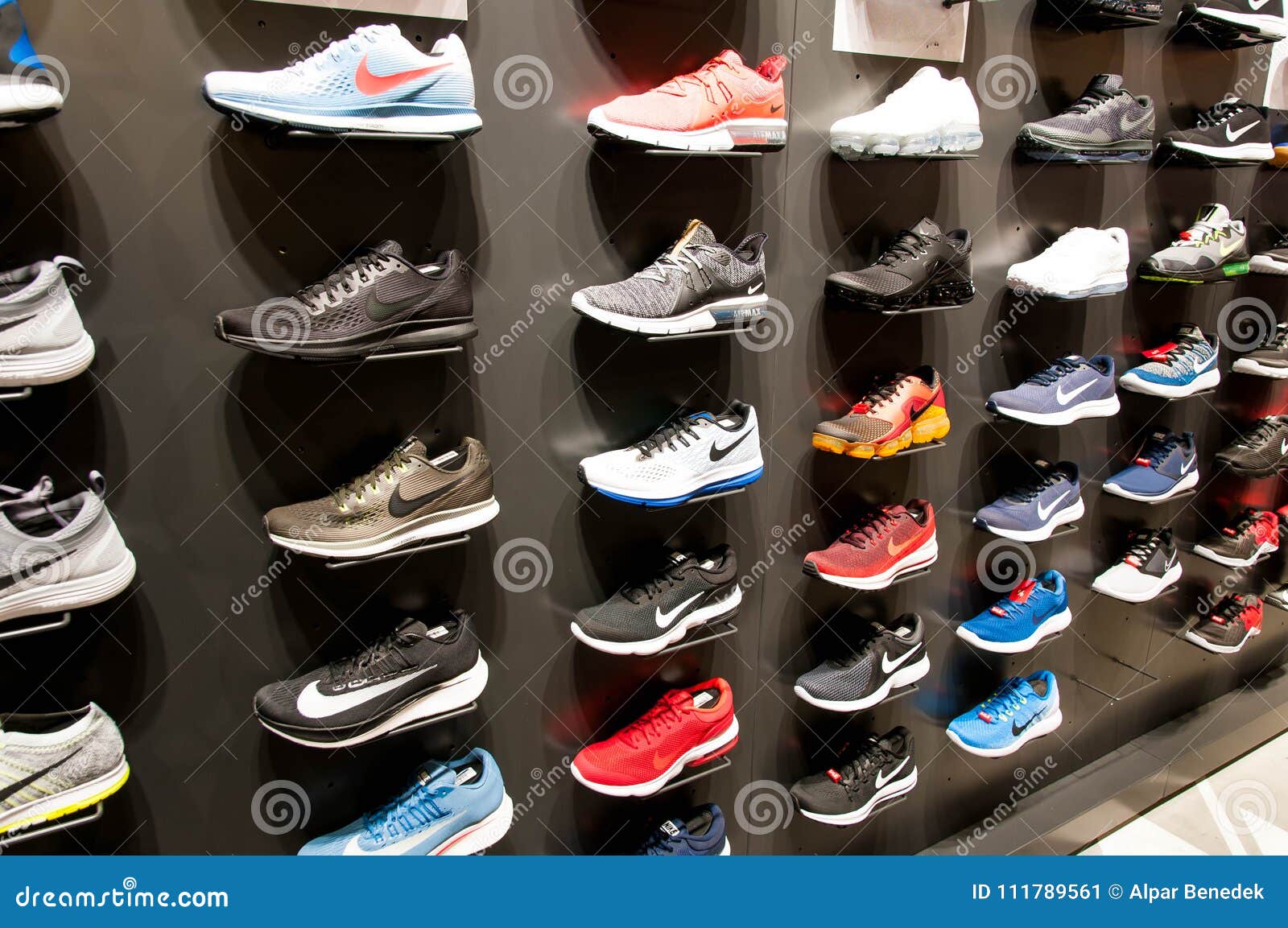 A Lot of New Modern Shoes on the Wall Editorial Photo - Image of ...