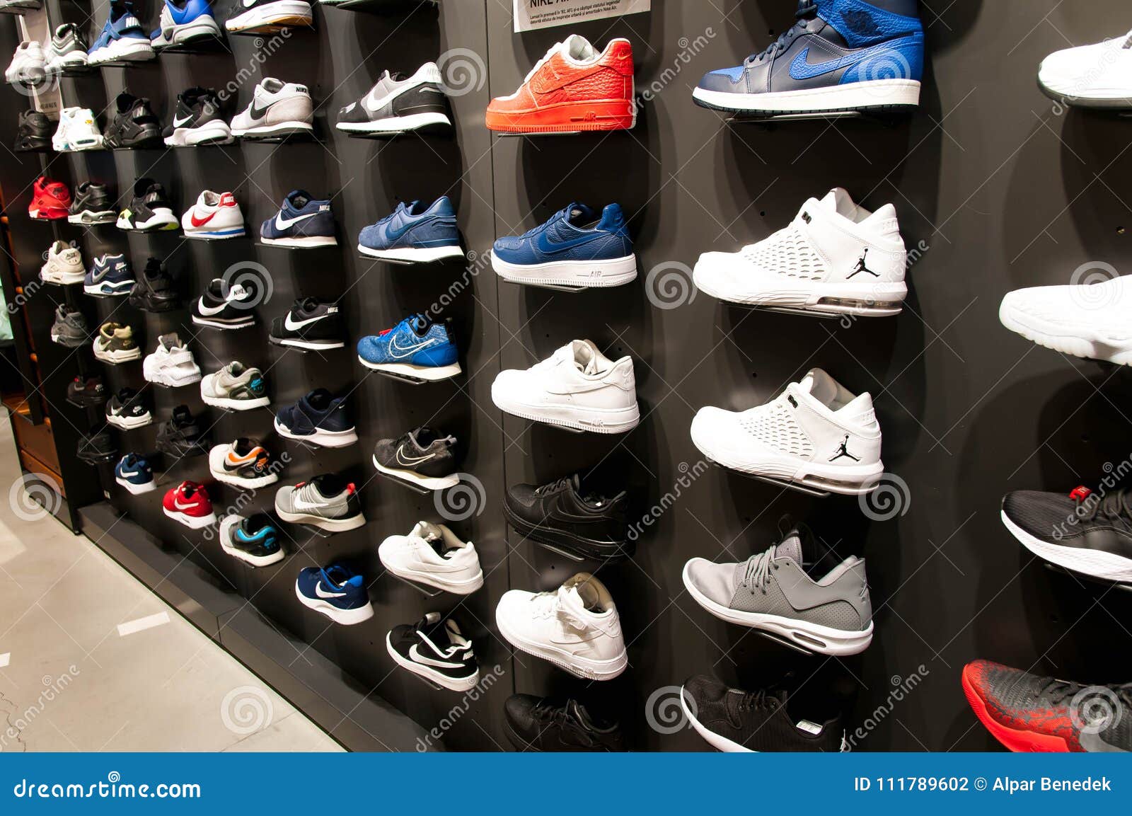 A Lot of New Modern Shoes on the Wall Editorial Photography - Image of  apparel, beautiful: 111789602