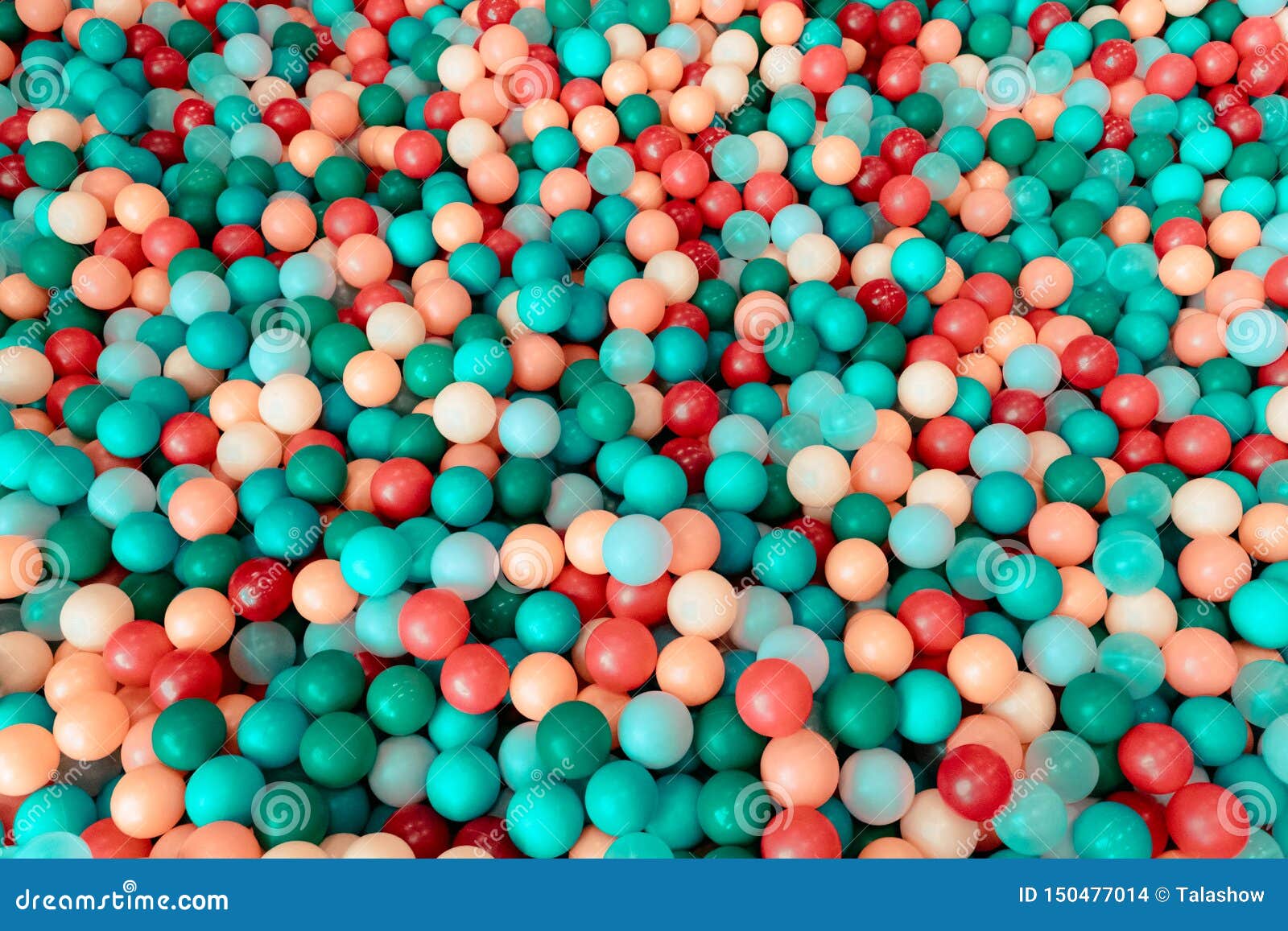 Lot of Plastic and Colored Balls in a Chaotic Manner Stock Photo
