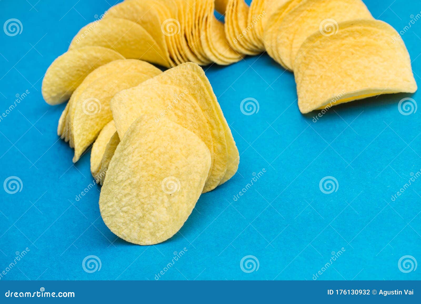 A lot of potatoes chips stock photo. Image of freshness 176130932