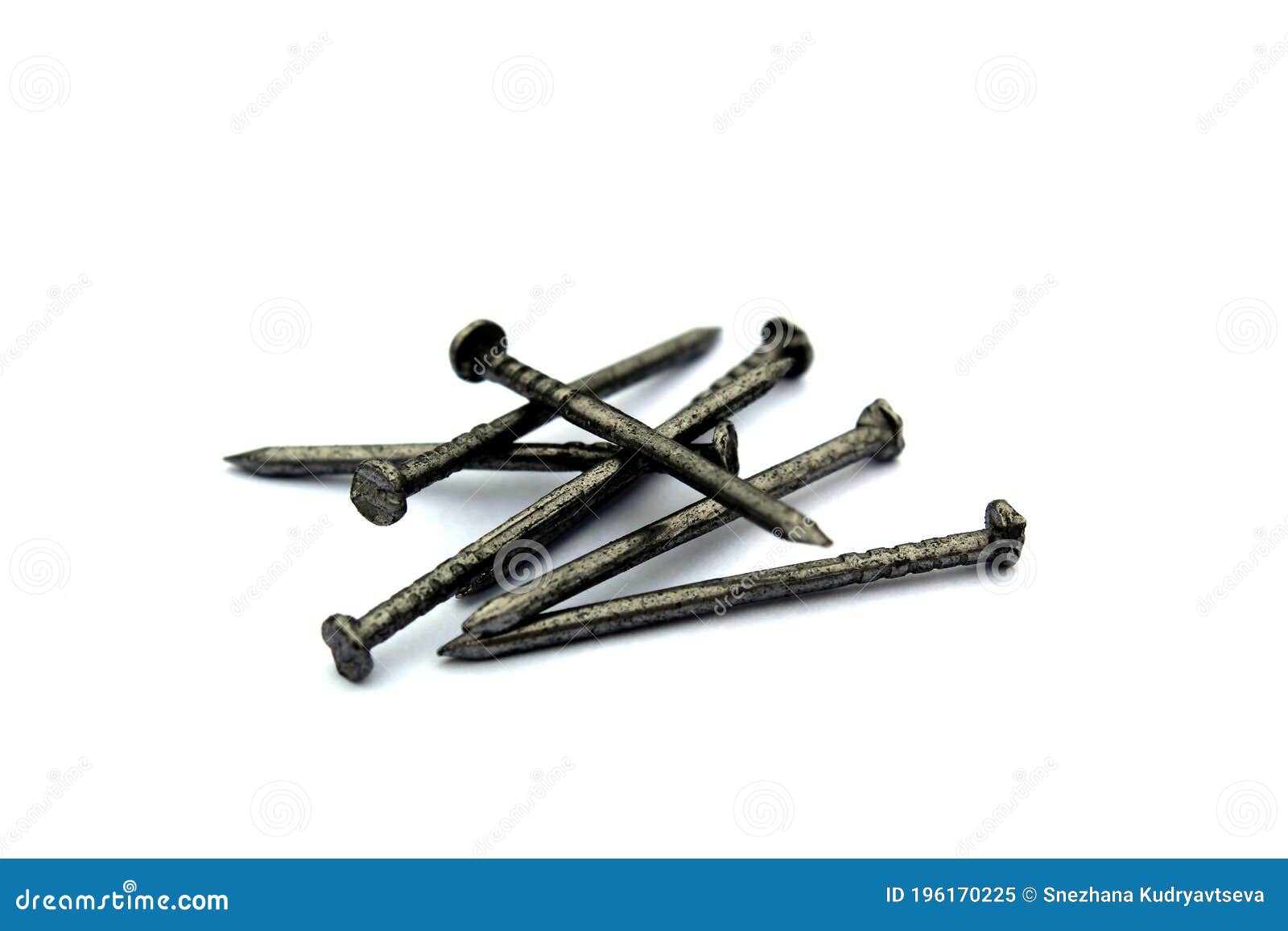 A Pile of Iron Nails Lie on a White Background Stock Image - Image of ...