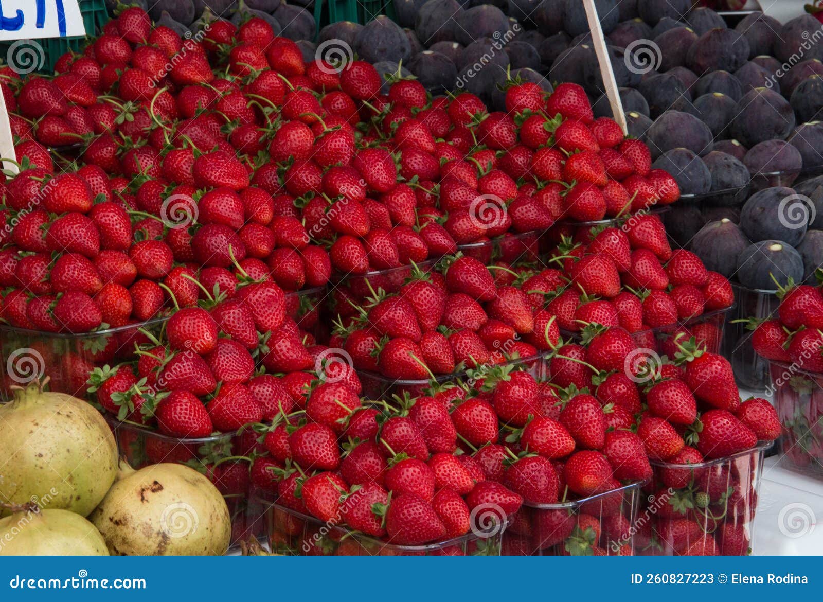 Lot of Strawberries on the Counter Market. a Lot of Strawberries