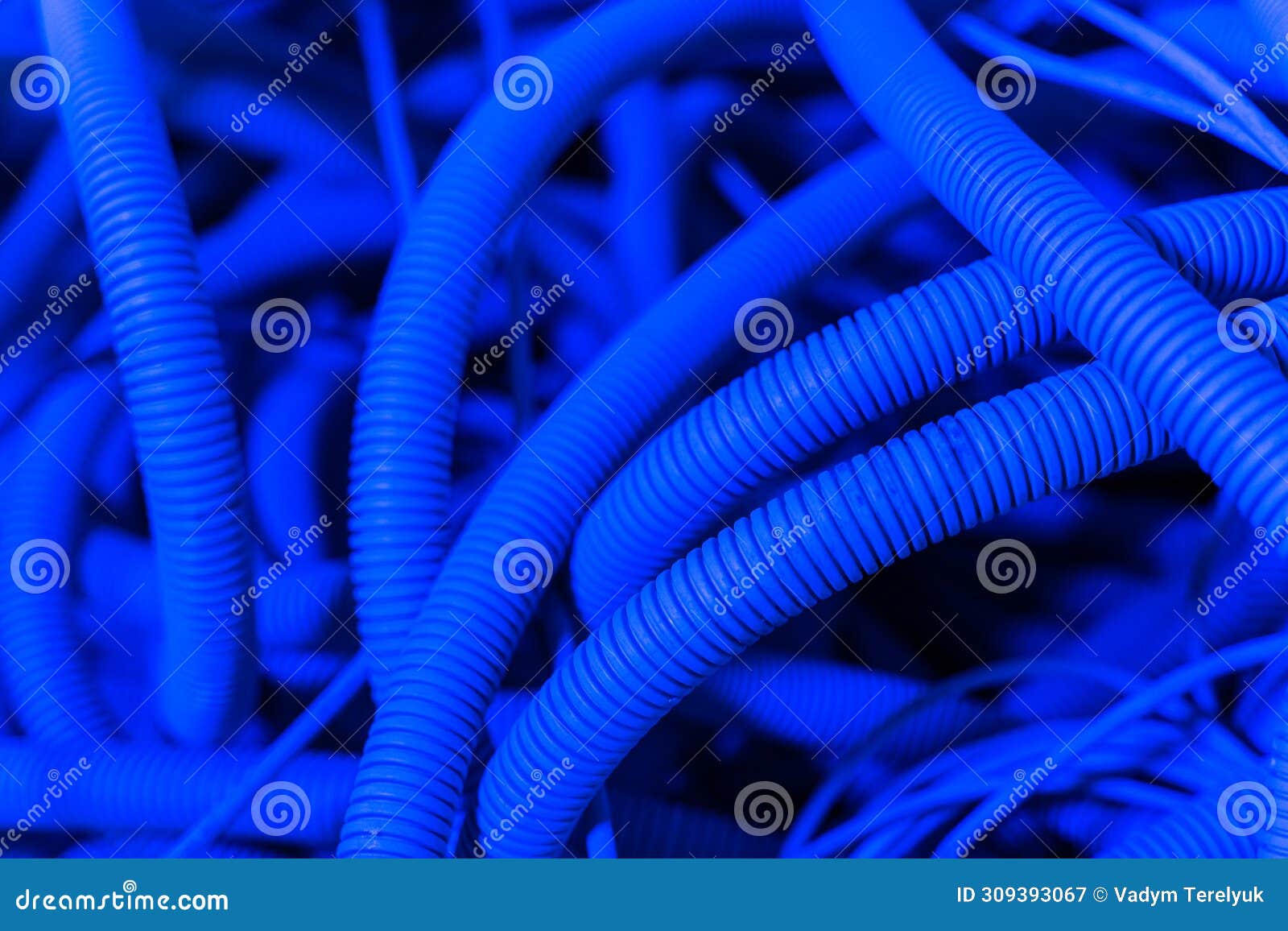 a lot of tubes and cables in neon light. air conditioning tube. repair concept. closeup