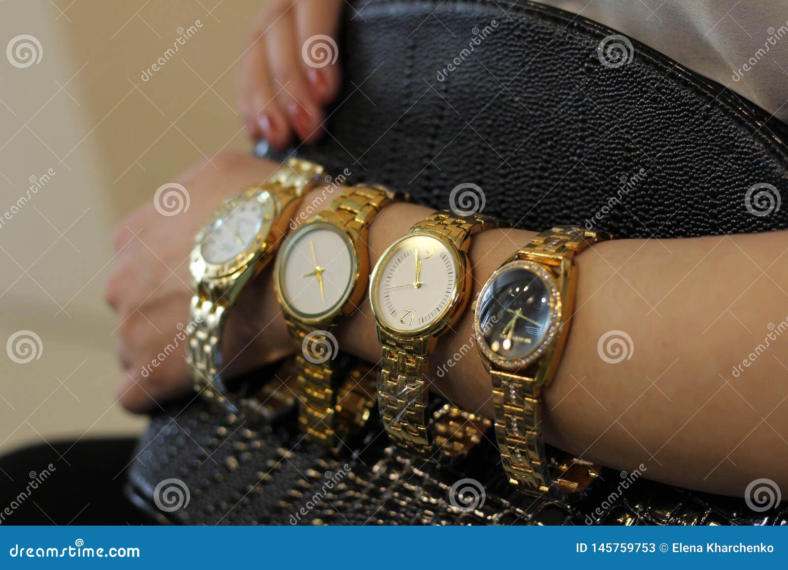 A Lot of Watches the Girl Has on Her Hand a Gold Watch Stock Image - Image  of bracelet, organization: 145759753