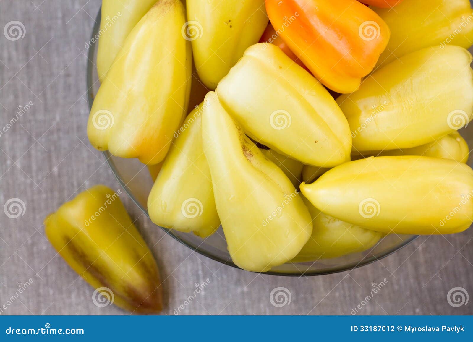 A Lot Of Yellow Peppers Lying On A Plate Stock Photo ...
