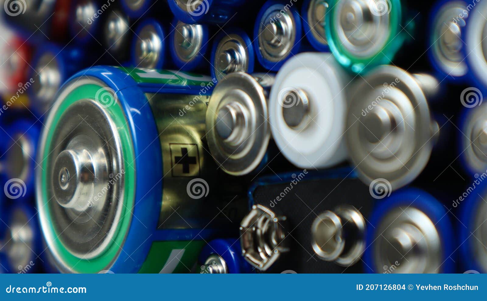 lots of used household alkaline batteries type aa, aaa, pp3, d, c, collected for recycling. recycling and ecology problems. top