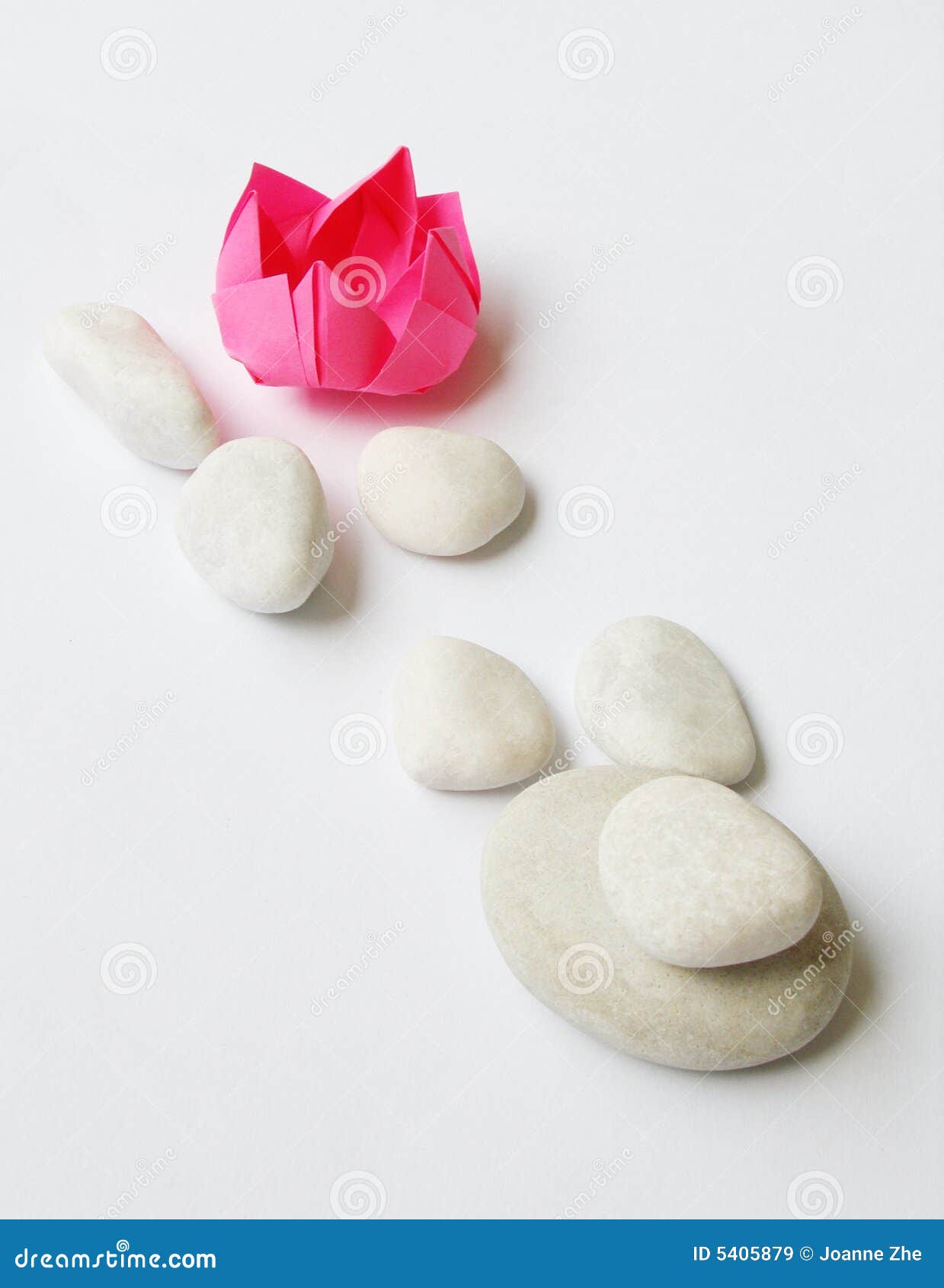 lotus origami, white pebbles