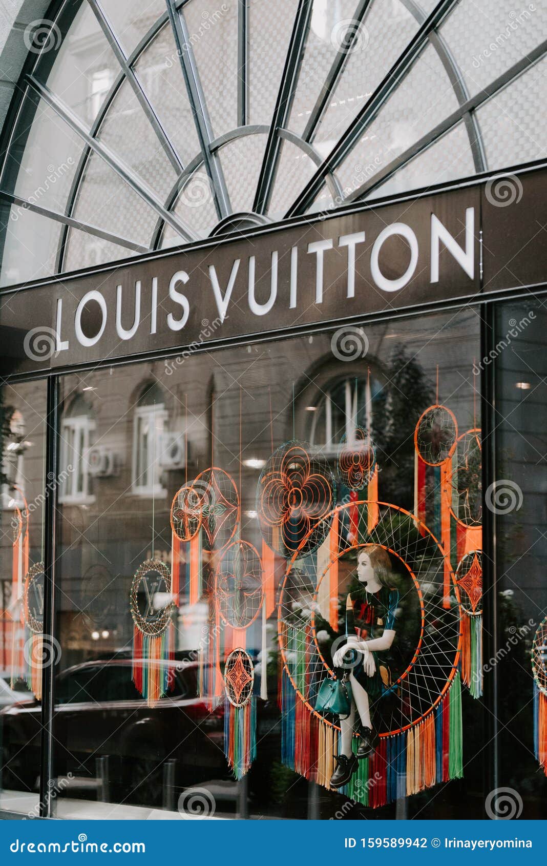 Louis Vuitton Boutique. Signboard Logo Brend Sign Of Louis Vuitton On Store, Shop, Mall ...