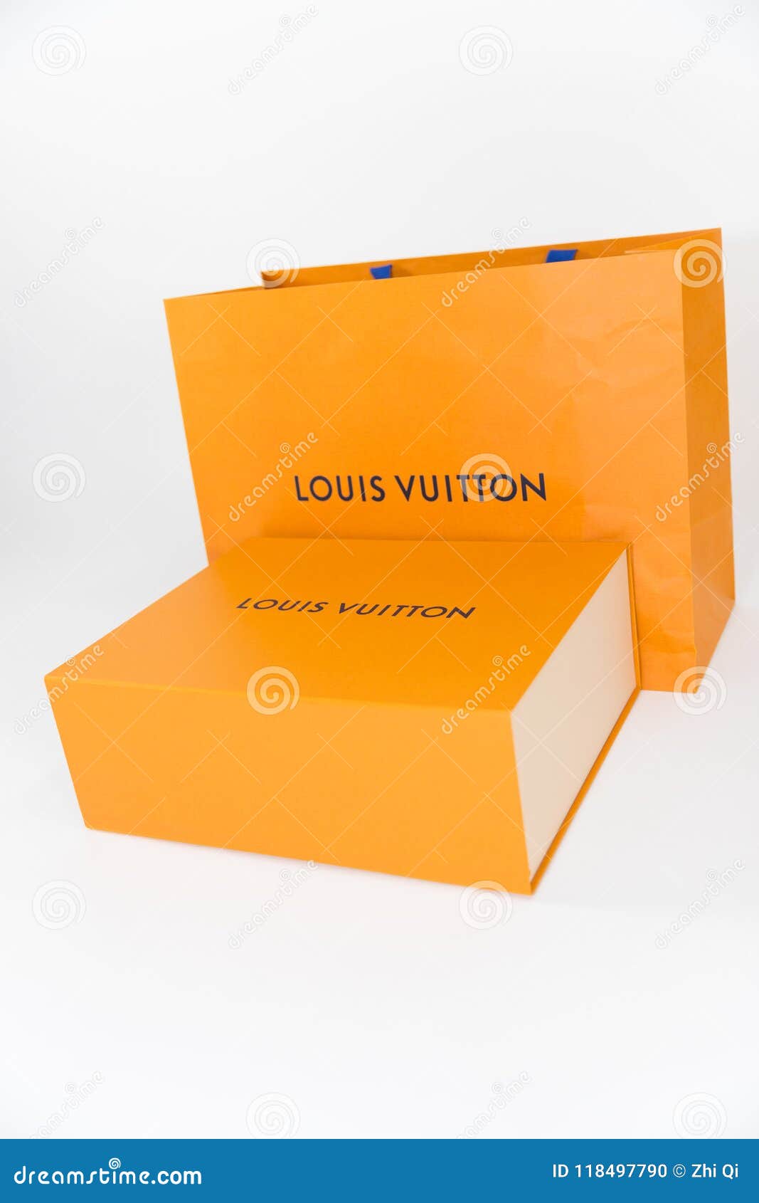 Classic Famous Louis Vuitton Orange Product Box Packaging with a Bow Free  Stock Photo