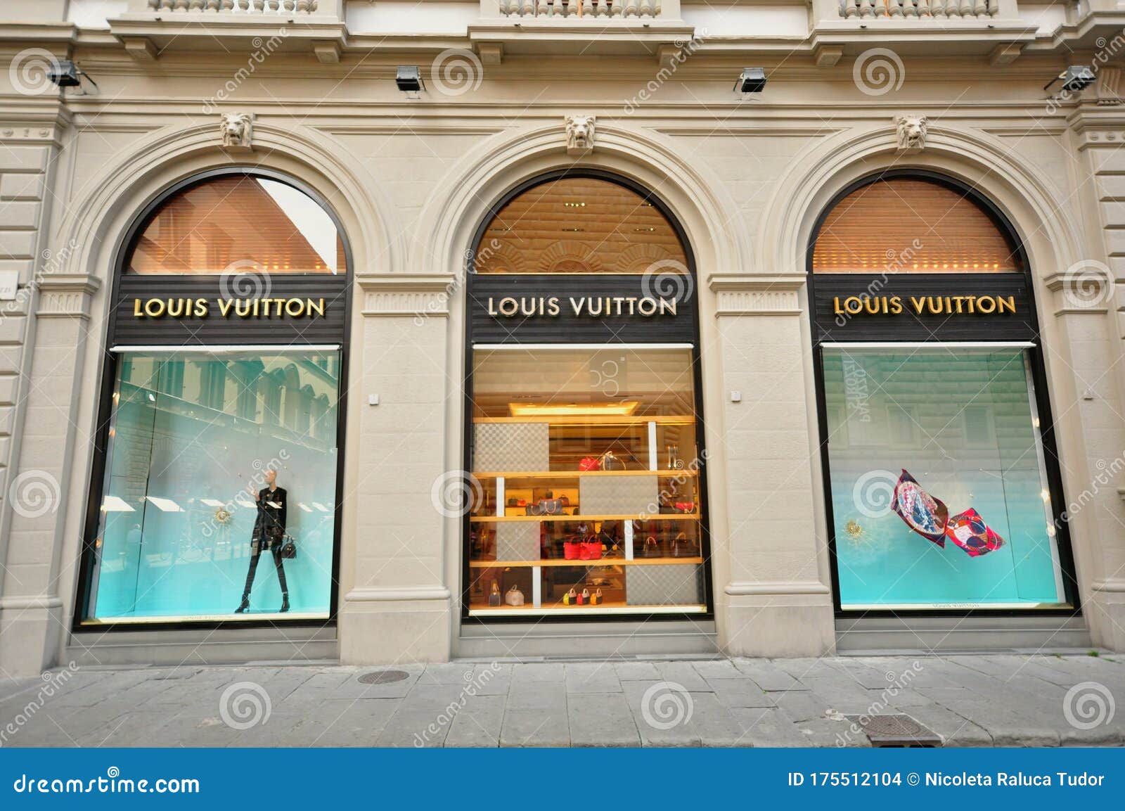 Shop windows of the Louis Vuitton boutique, famous high fashion brand, with  people and tourists in the historic centre of Florence, Tuscany, Italy  Stock Photo - Alamy