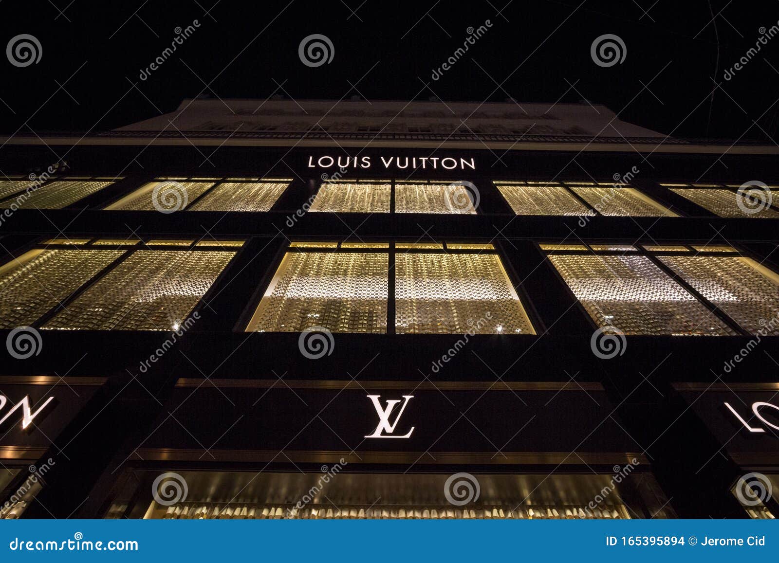 Louis Vuitton Brand Logo Fashion With Name Black Design Symbol Clothes  Vector Illustration With Brown Background 23871552 Vector Art at Vecteezy