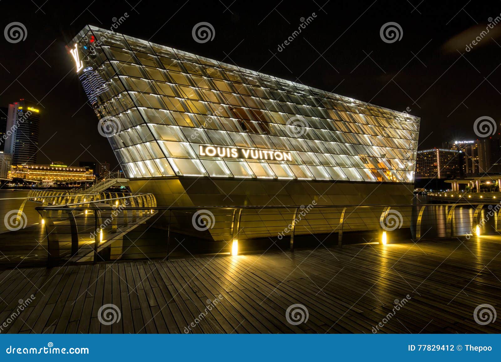 Louis Vuitton Shop in Marina Bay at Night. Editorial Photography