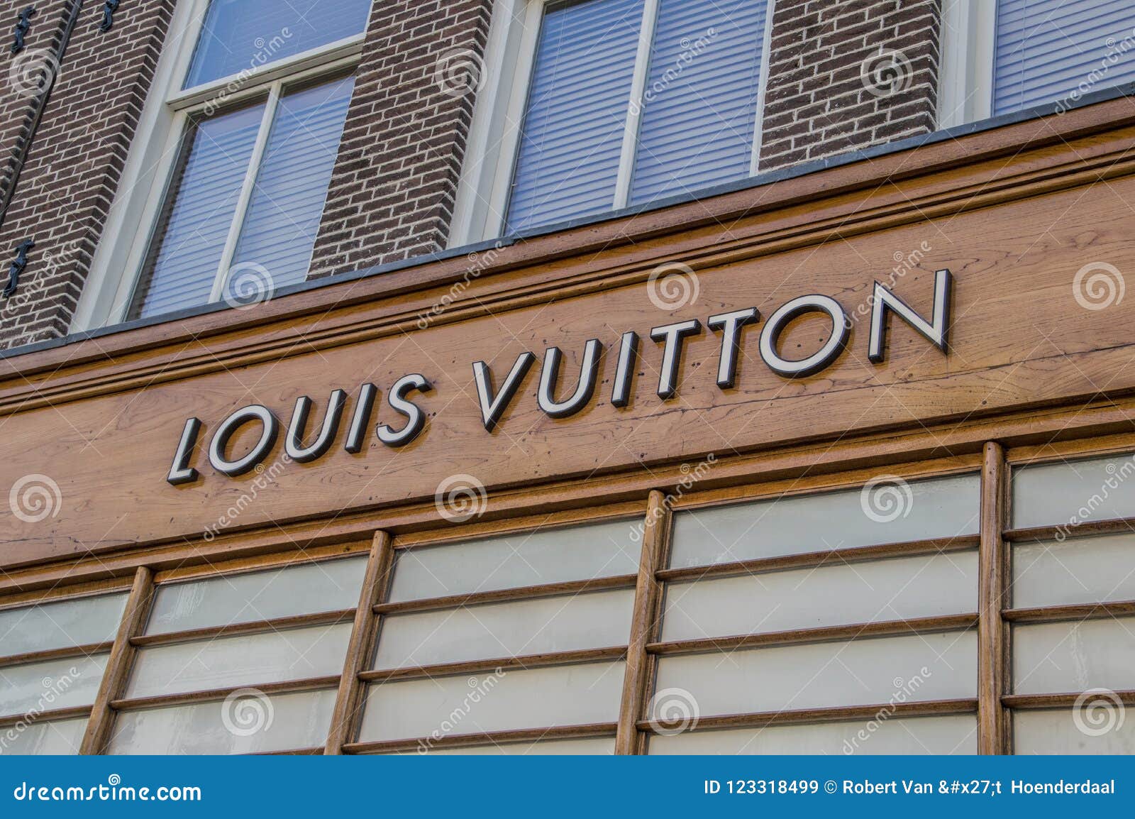 Louis Vuitton Sign Above a Shop Editorial Stock Image - Image of