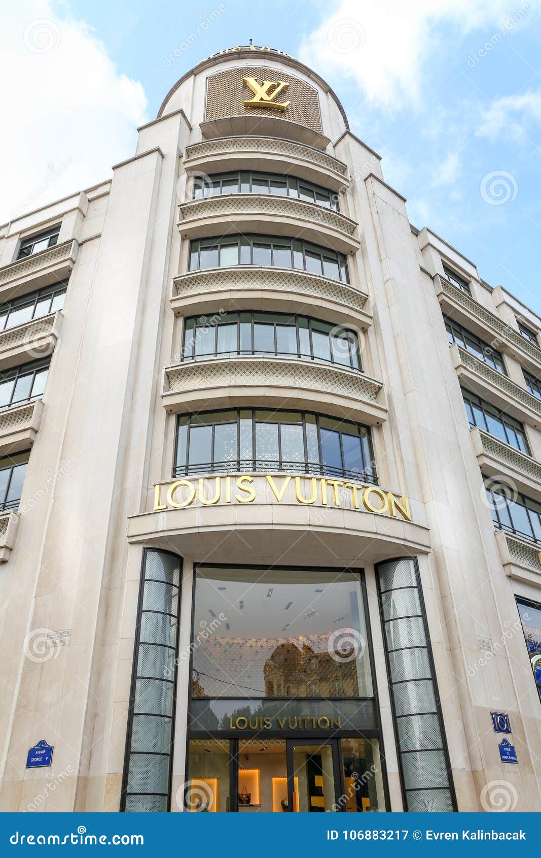 Street view of Champs-Elysees Avenue with building LOUIS VUITTON