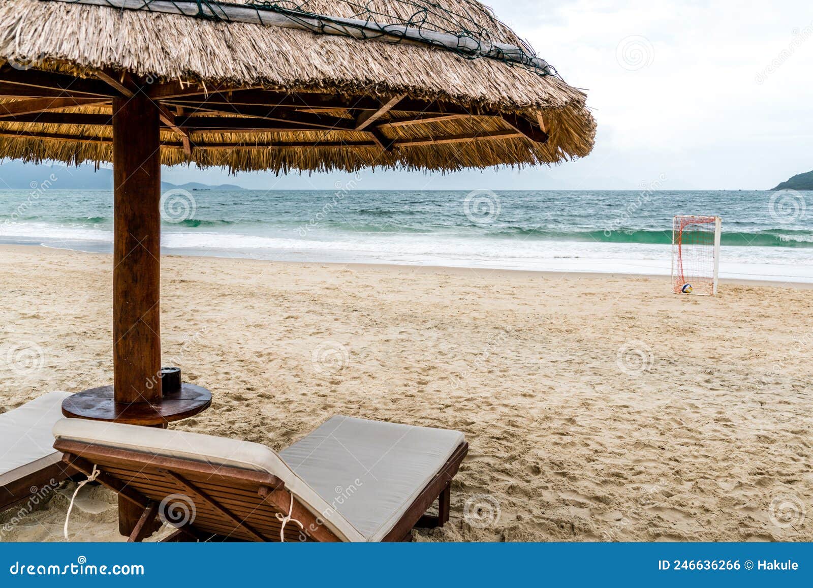Lounge chair on the beach stock photo. Image of umbrella 246636266