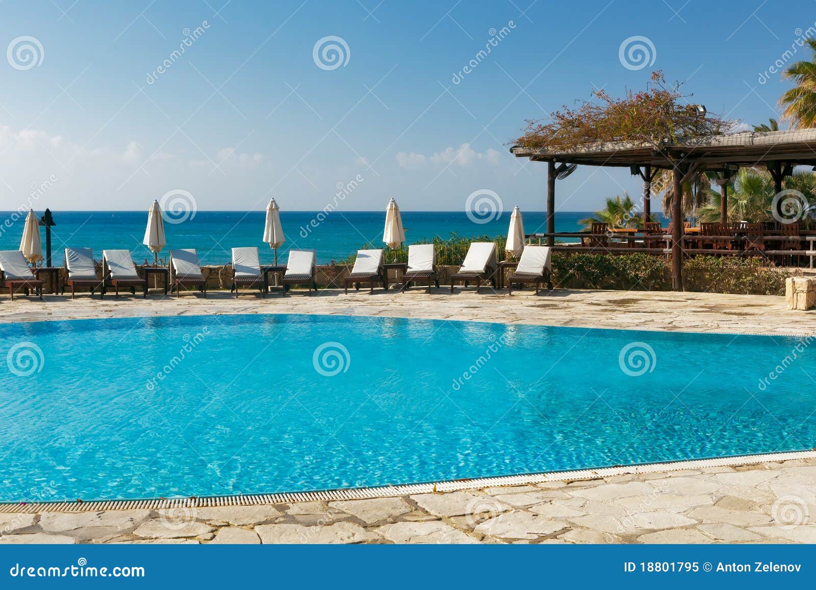 Lounges near the pool stock image. Image of luxury, resort 18801795