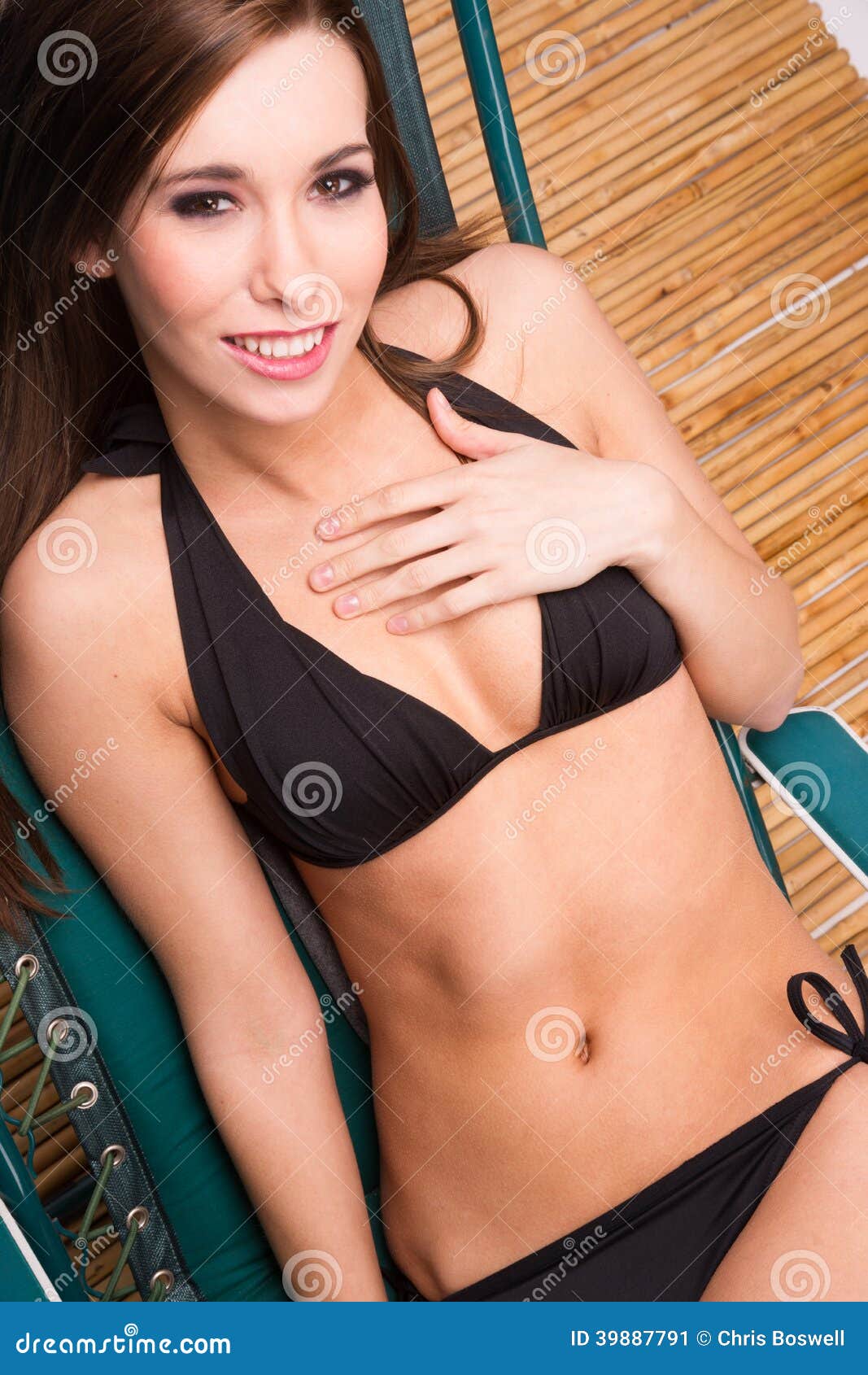 Lounging Woman Sunbathing Lawn Chair Bamboo Floor Black Bikini Stock Image 