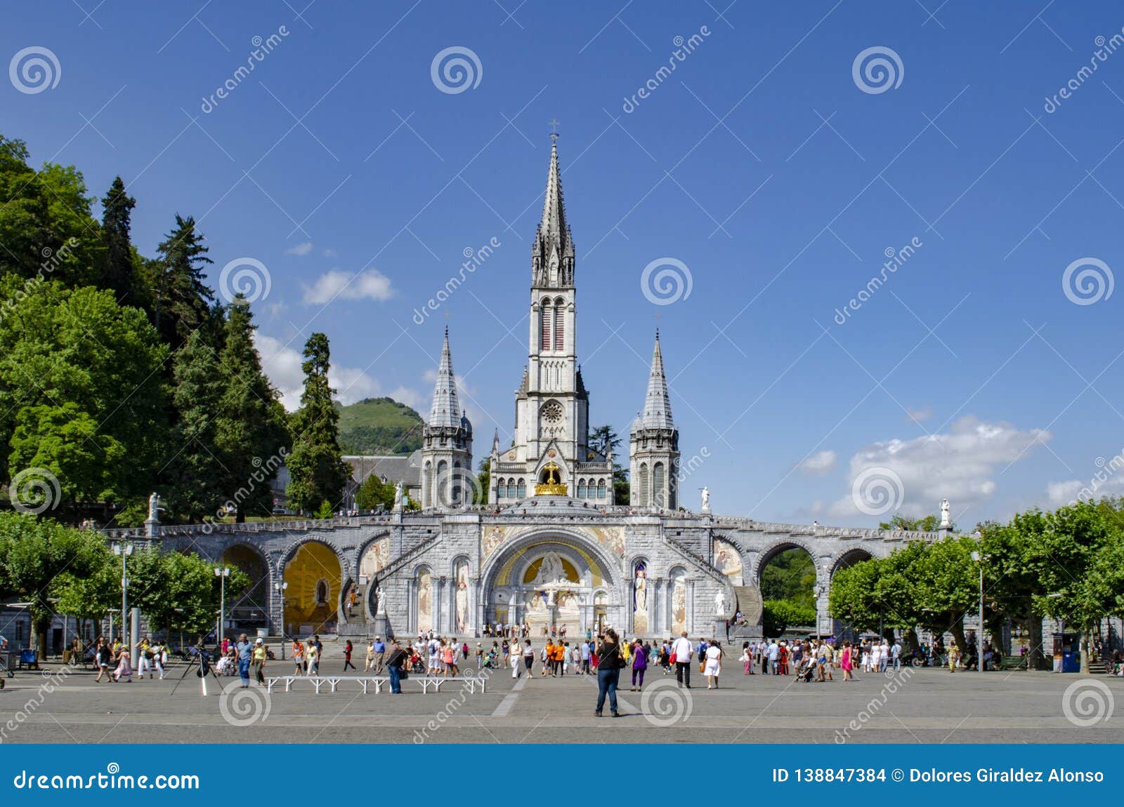 Tourists Walking in Front of the Cathedral of the Sanctuary of Lourdes ...