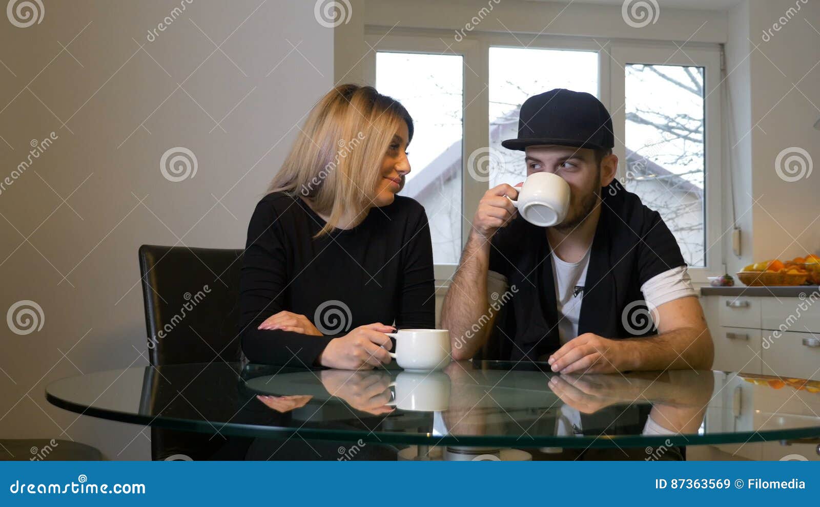 Cofi drinking coffee and playing with her husband