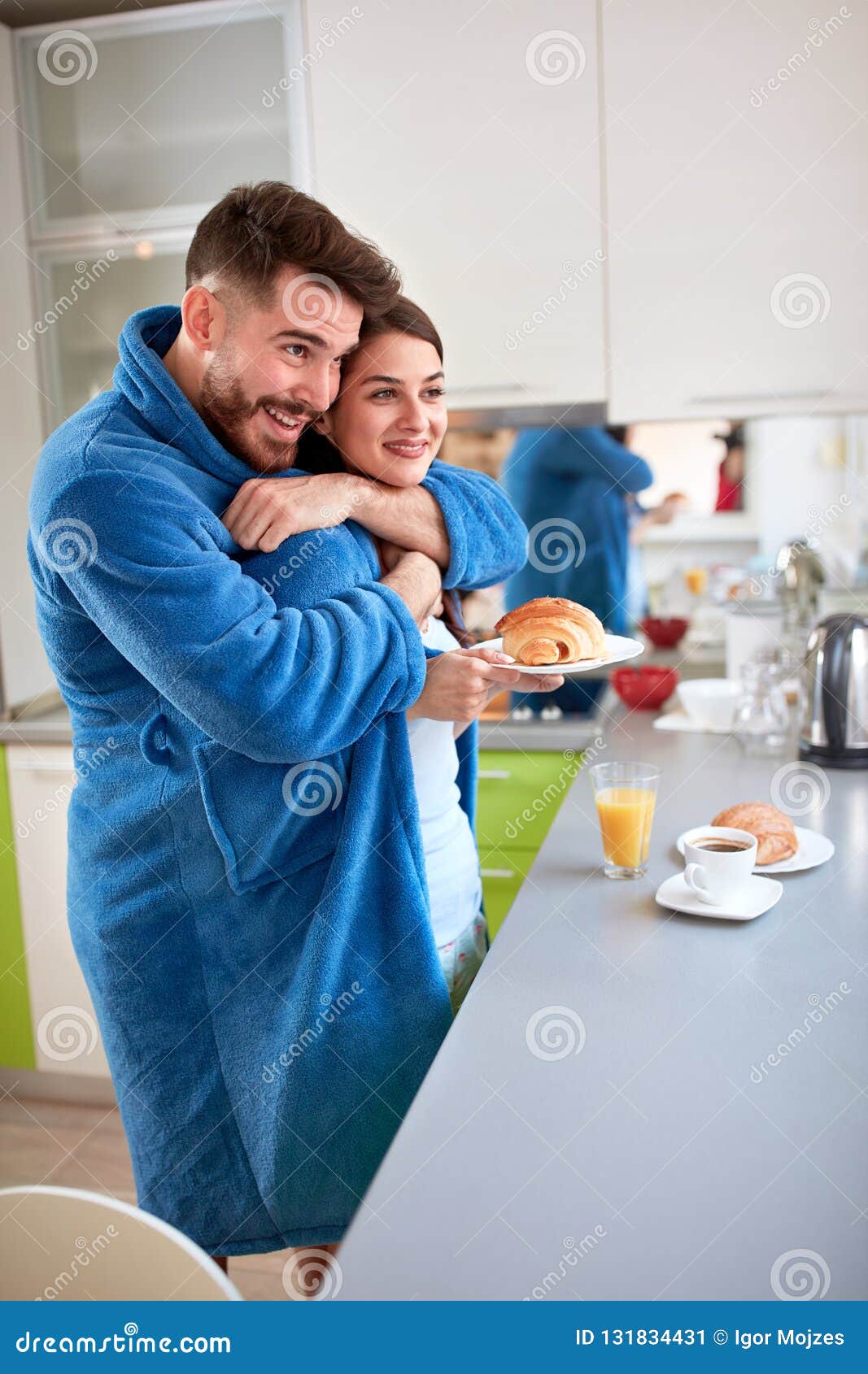 Couple Hugging in the Kitchen Stock Image - Image of attractive ...