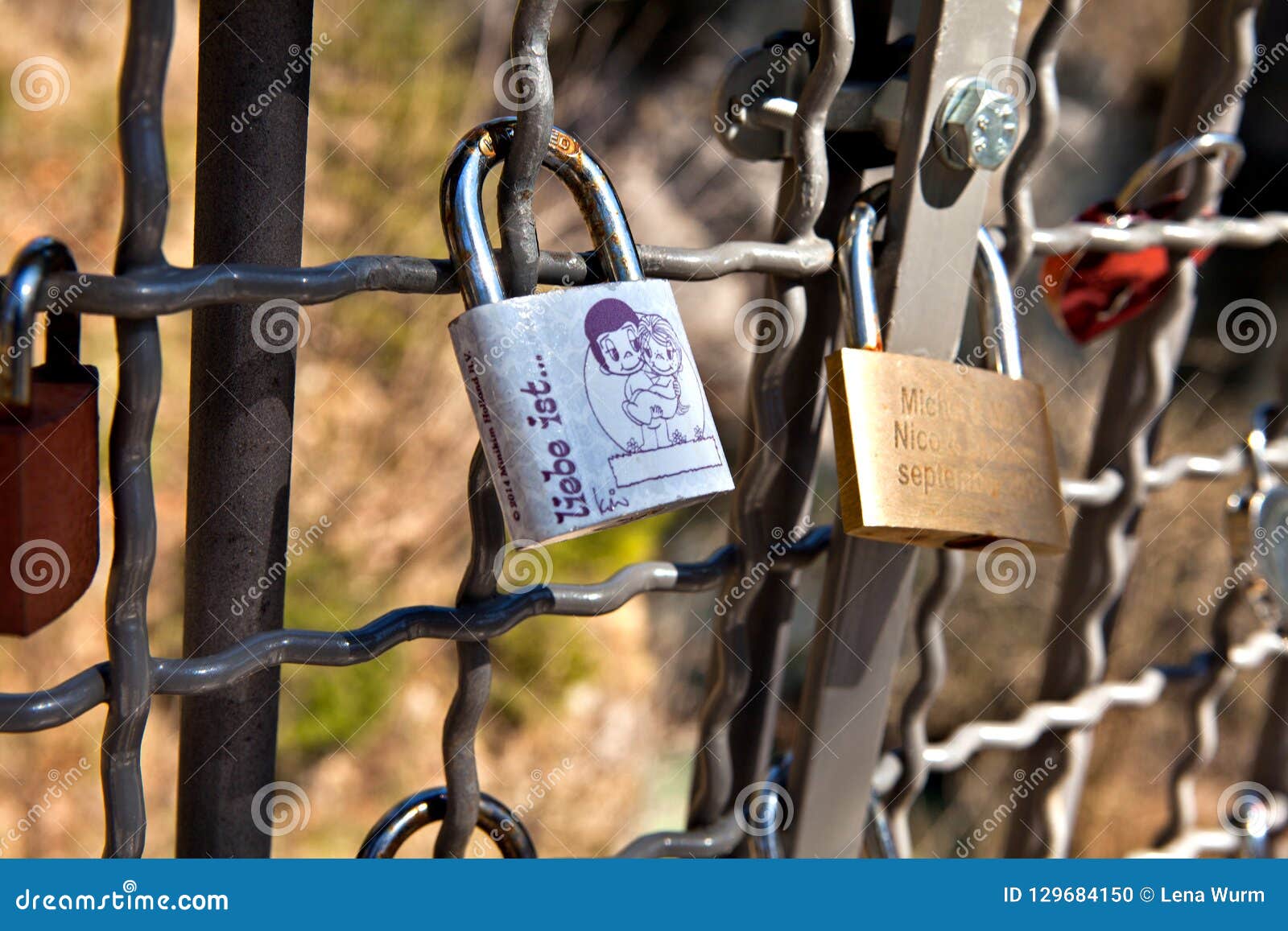 Love locks at the Bridge stock photo. Image of river 129684150